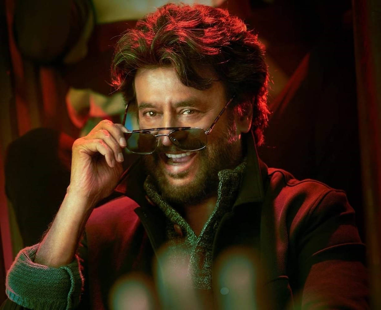 Rajinikanth, sunglasses, dim red-lit room, SD Desktop Wallpaper