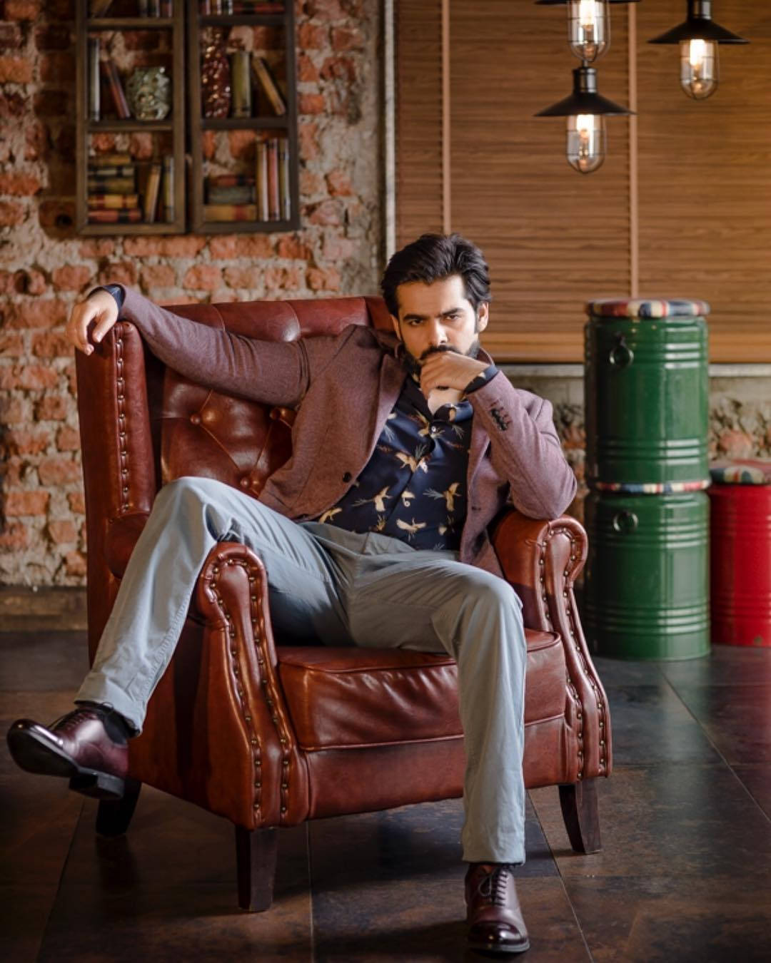 Ram Pothineni, leather armchair, exposed brick wall, HD Phone Wallpaper