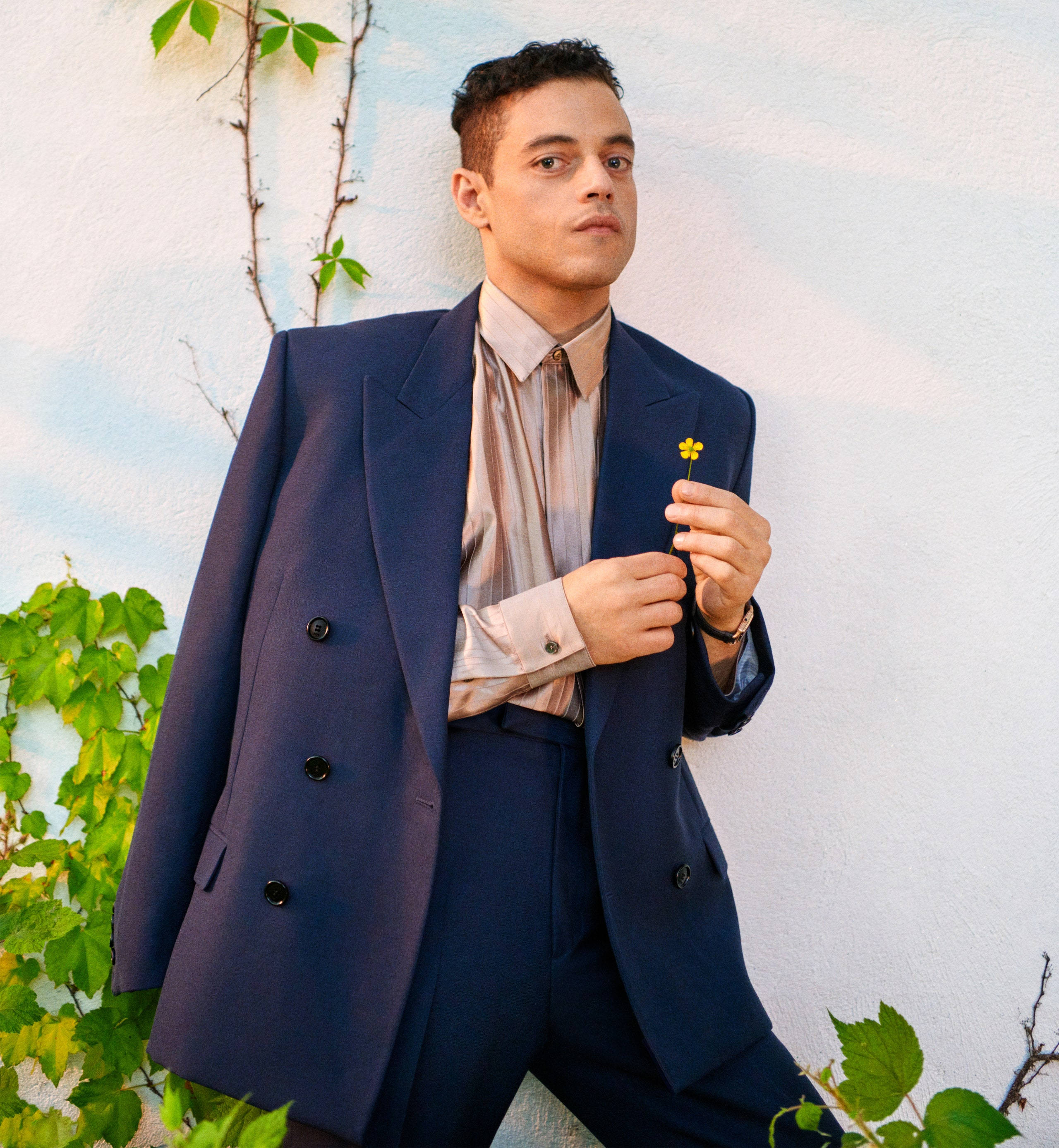 Rami Malek, navy suit, yellow flower, 2K Phone Wallpaper