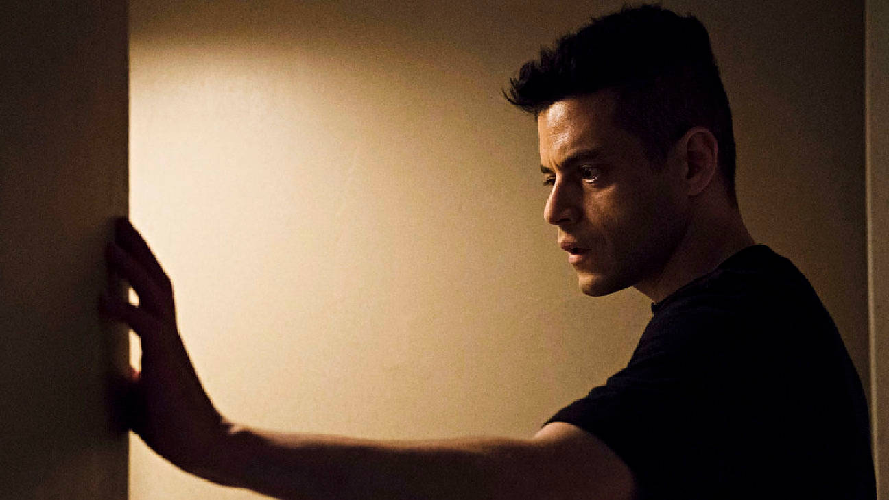 Rami Malek, dark shirt, dimly lit room, HD Desktop Wallpaper