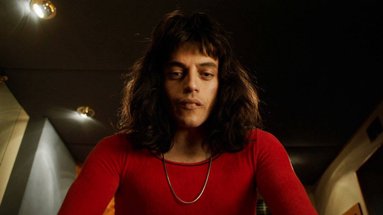 Rami Malek, red shirt, long dark hair, HD Desktop Wallpaper