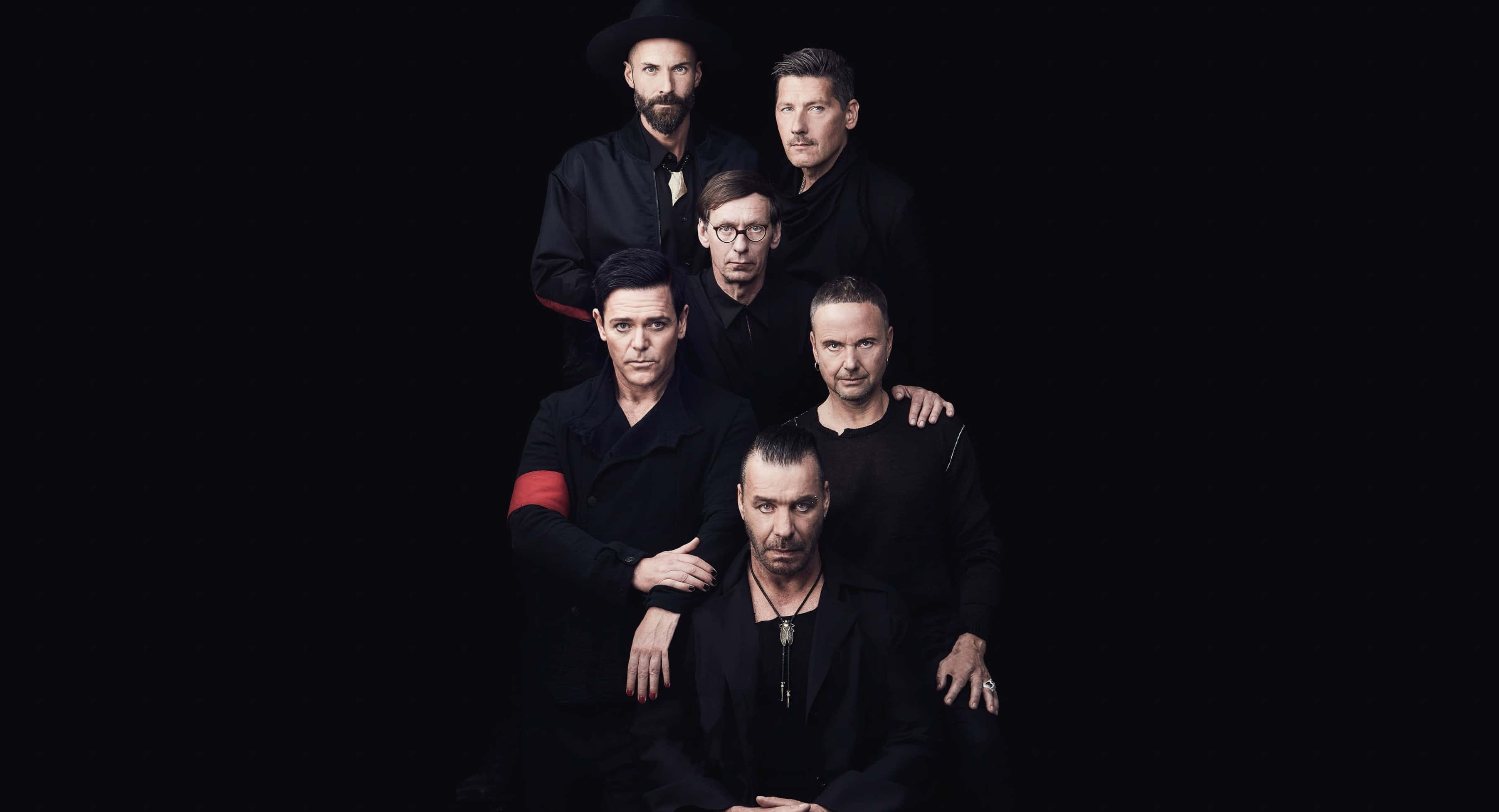 Rammstein, black attire, stark black background, 2K Desktop Wallpaper