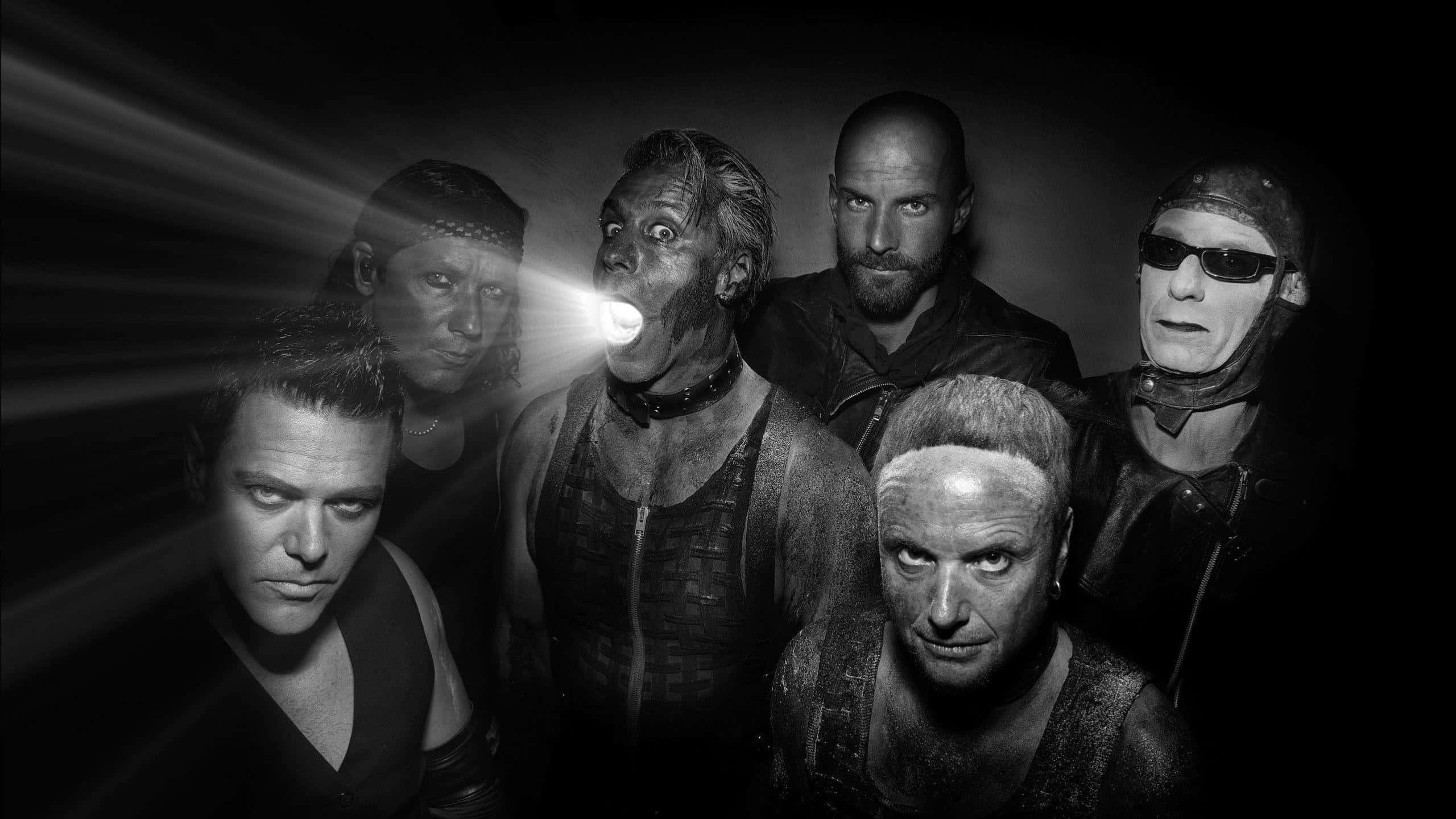 Rammstein, band members, dramatic lighting, 2K Desktop Wallpaper