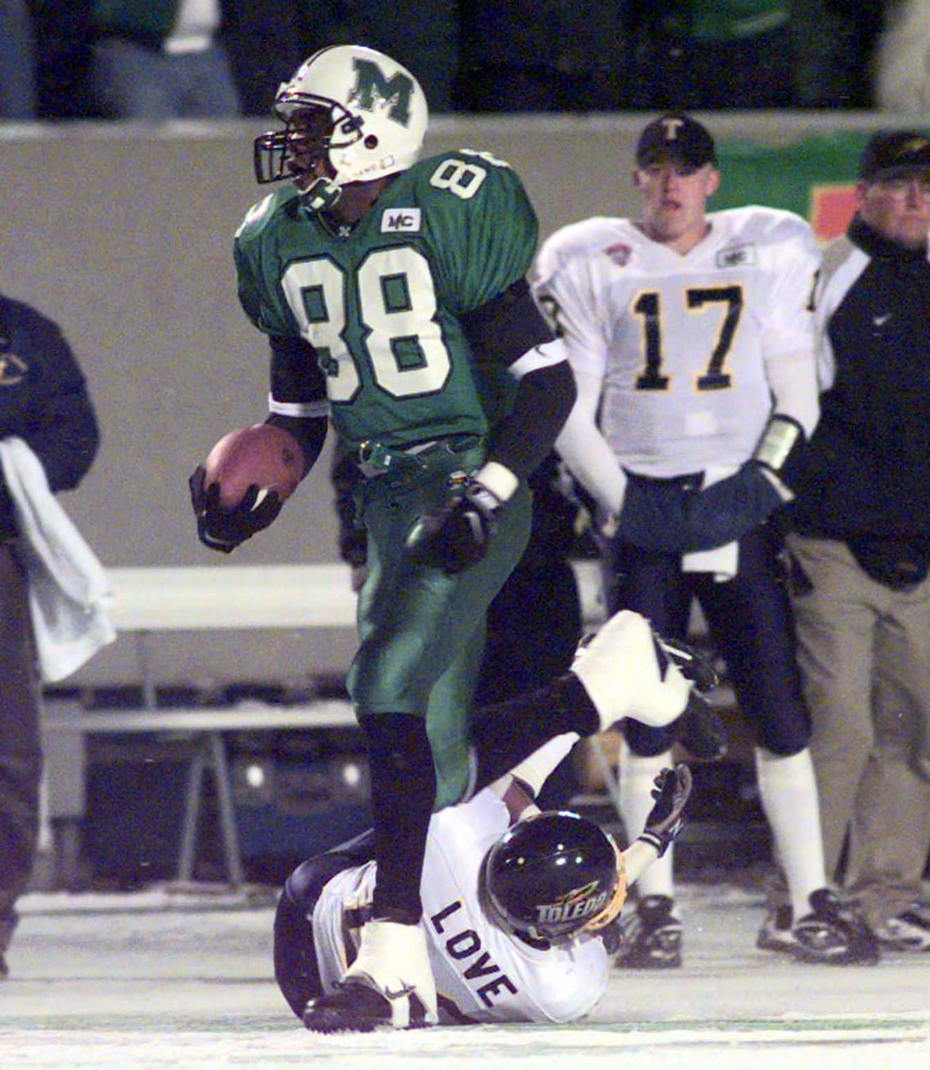 Randy Moss, green jersey number 88, snowy field, HD Phone Wallpaper