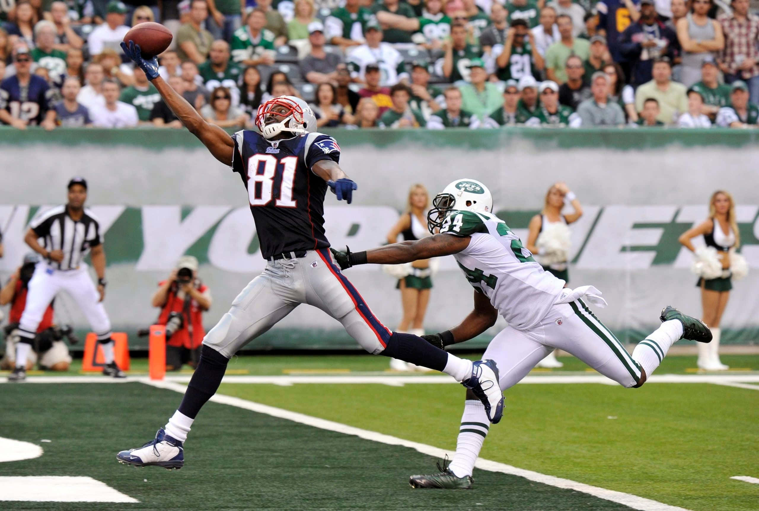 Randy Moss, navy jersey, white defender, 2K Desktop Wallpaper