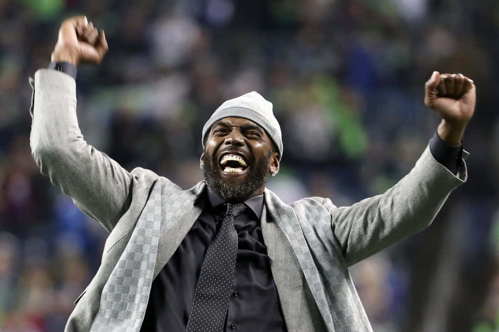Randy Moss, stadium, grey suit, SD Desktop Wallpaper