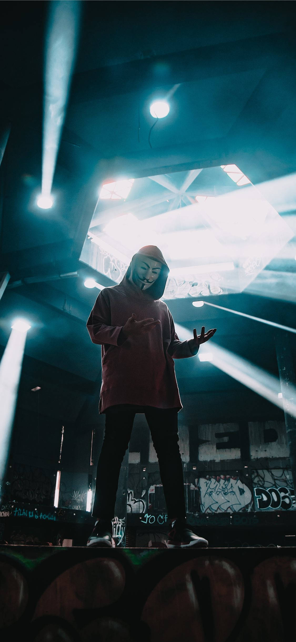 red hoodie, anonymous mask, blue spotlights, Full HD Phone Wallpaper
