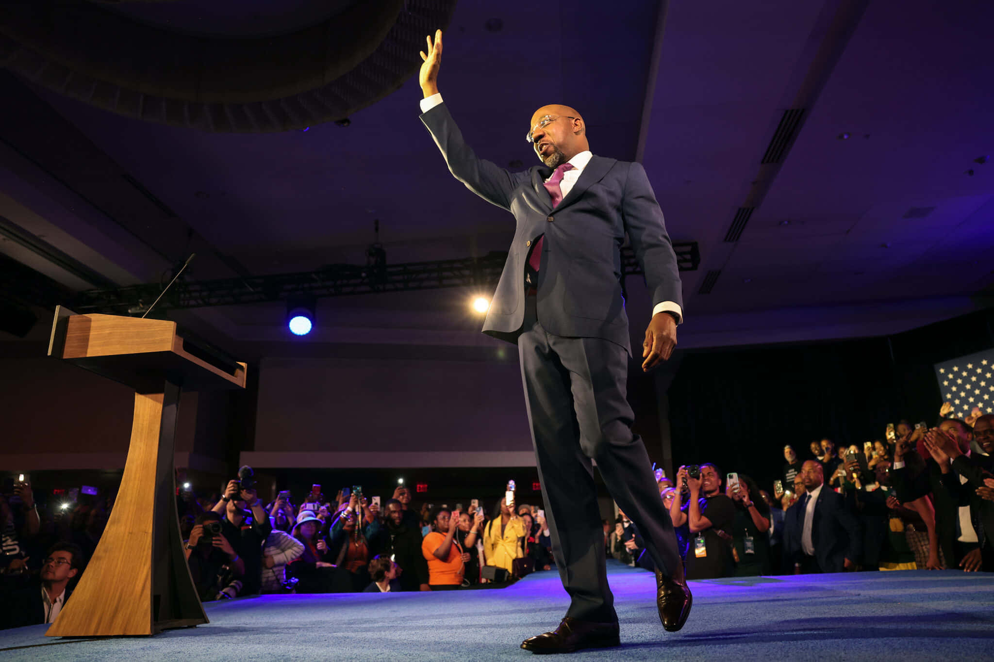Raphael Warnock, blue stage, purple lighting, Full HD Desktop Wallpaper