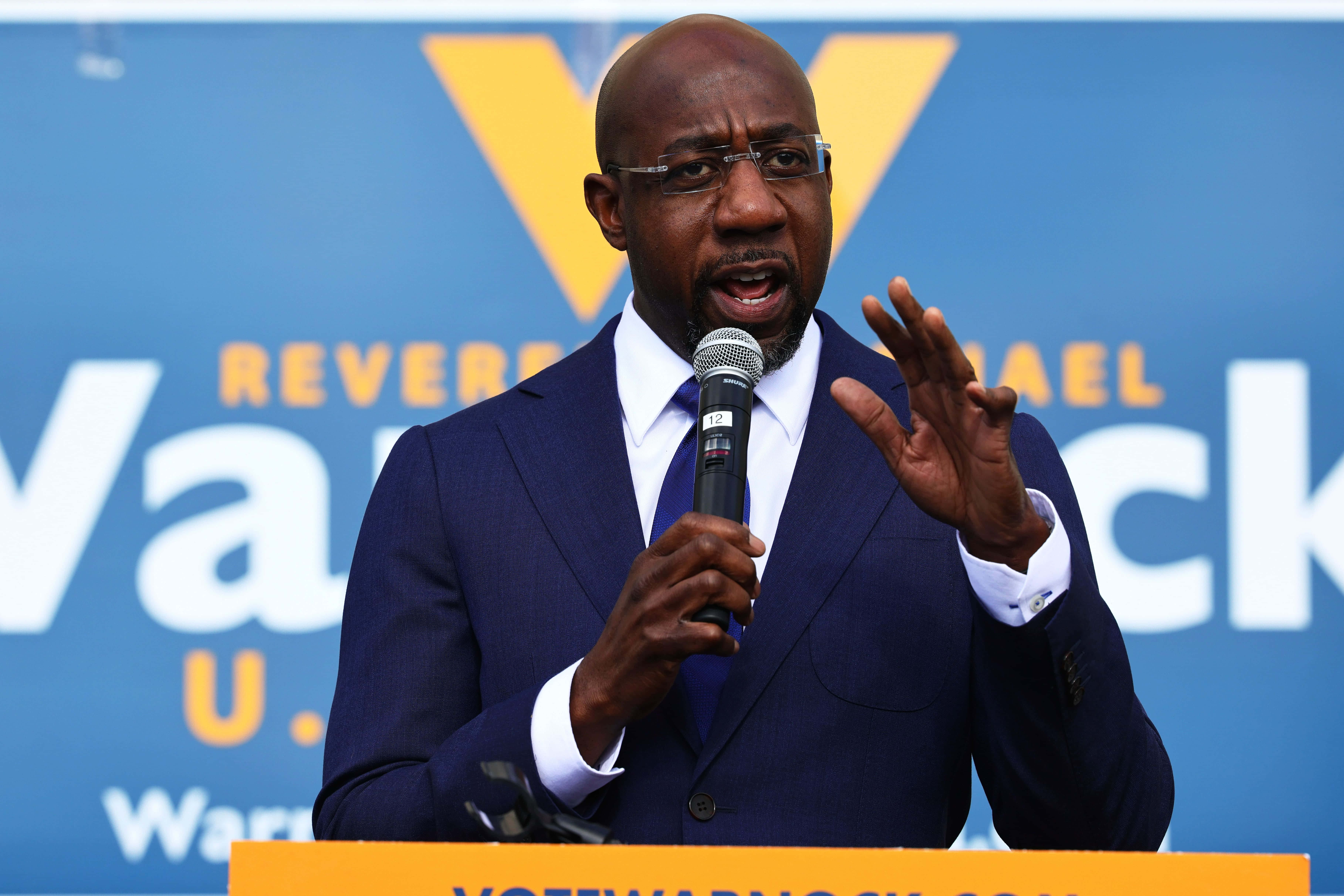 Raphael Warnock, navy suit, glasses, 5K Desktop Wallpaper