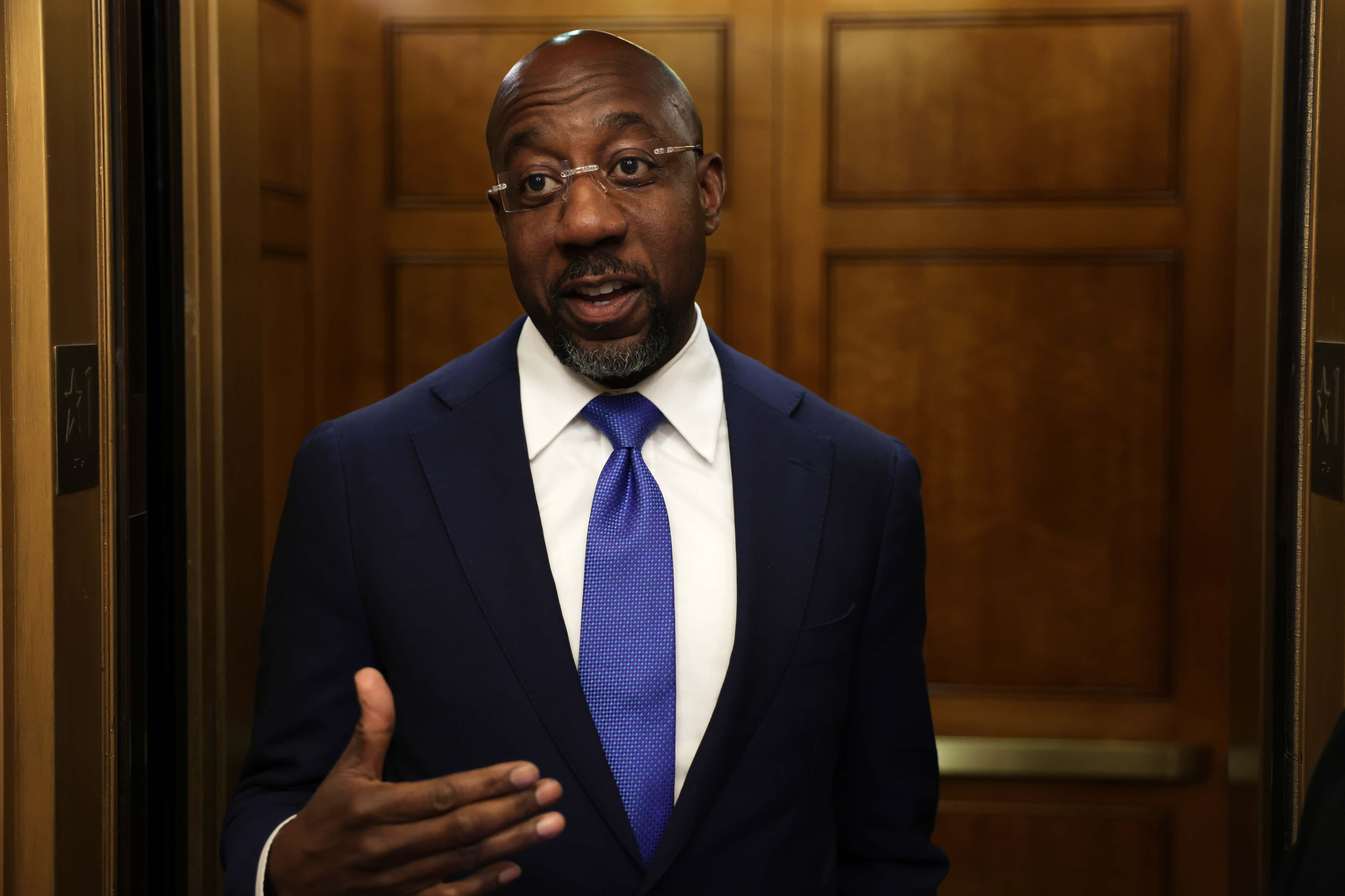 Raphael Warnock, navy suit, blue tie, 5K Desktop Wallpaper