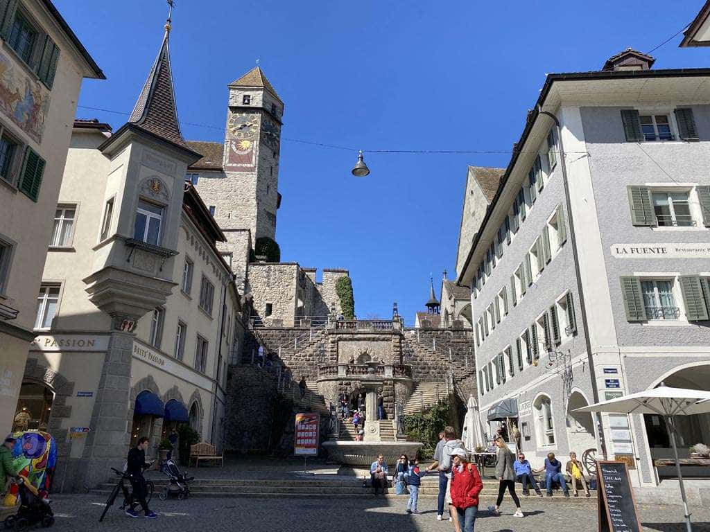 Rapperswil-Jona, sunny cobblestone town square, historic stone buildings, SD Desktop Wallpaper