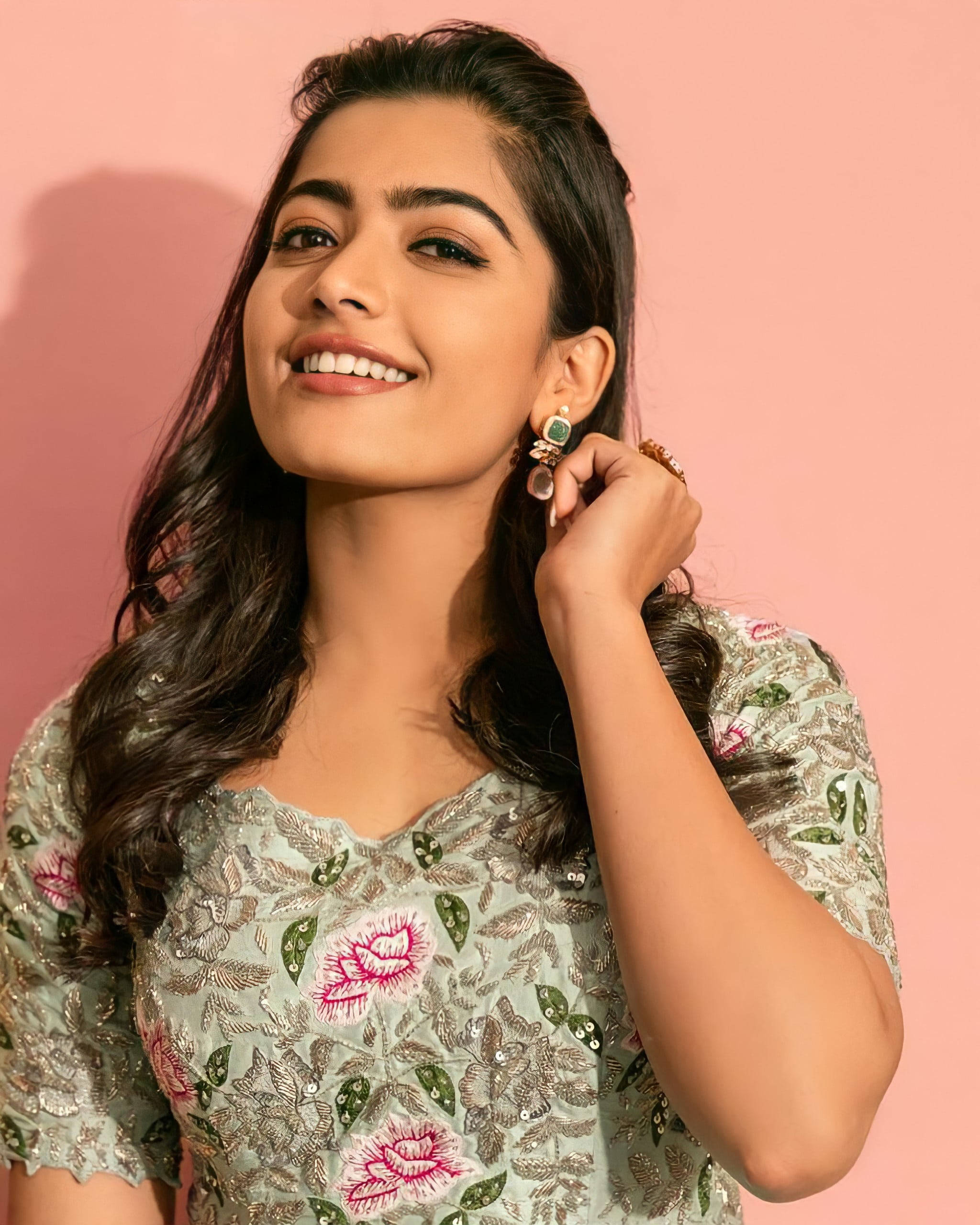 Rashmika Mandanna, pink backdrop, dark hair, 2K Phone Wallpaper