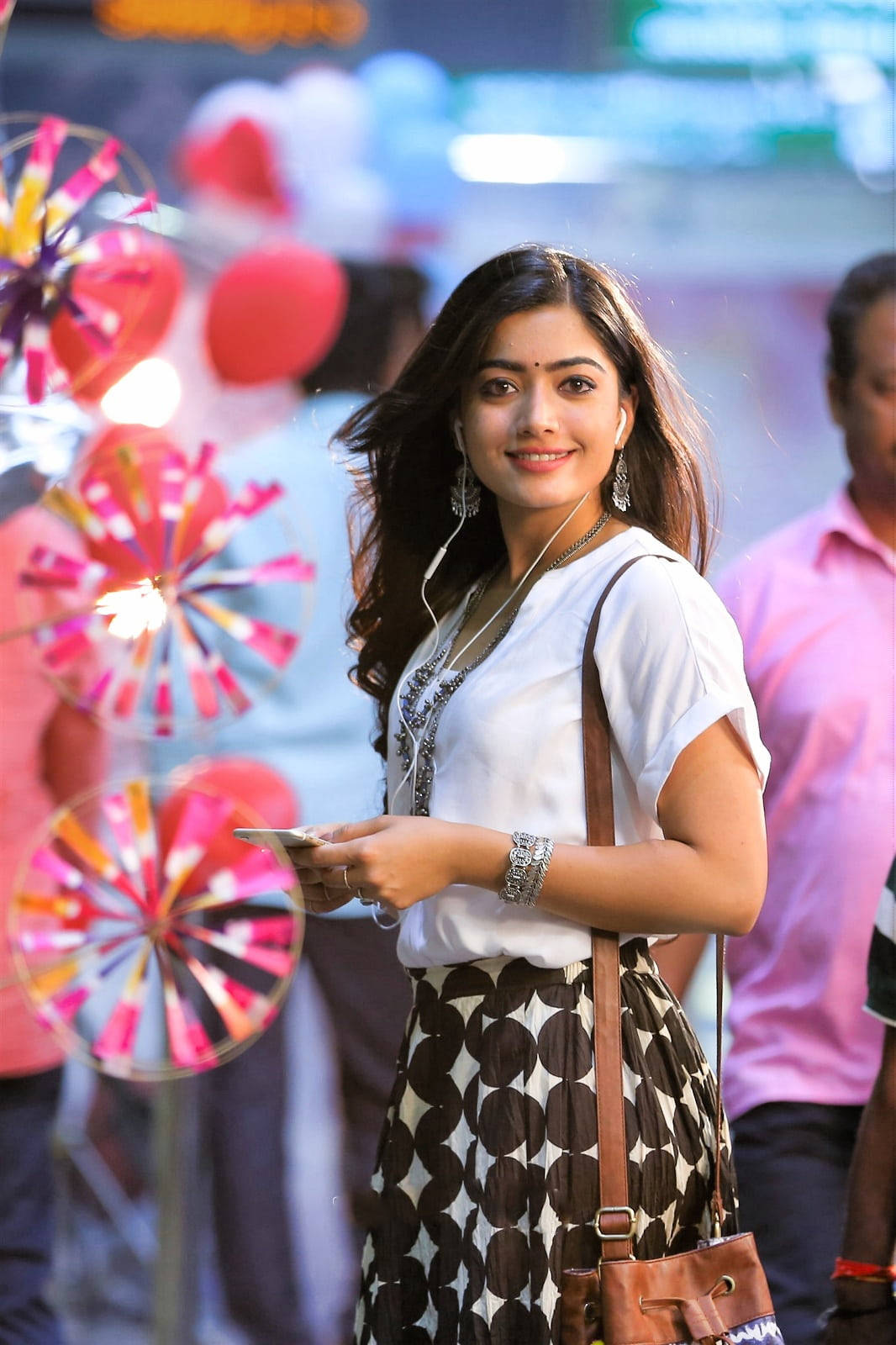 Rashmika Mandanna, casual attire, vibrant street market, HD Phone Wallpaper
