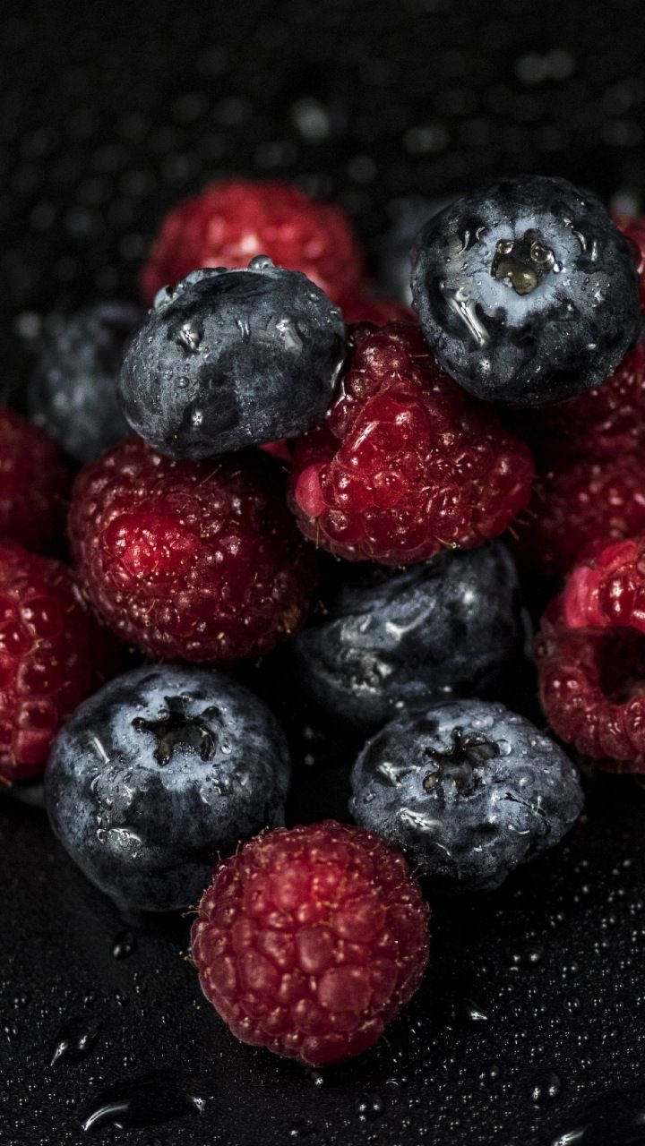 raspberries, blueberries, water droplets, HD Phone Wallpaper