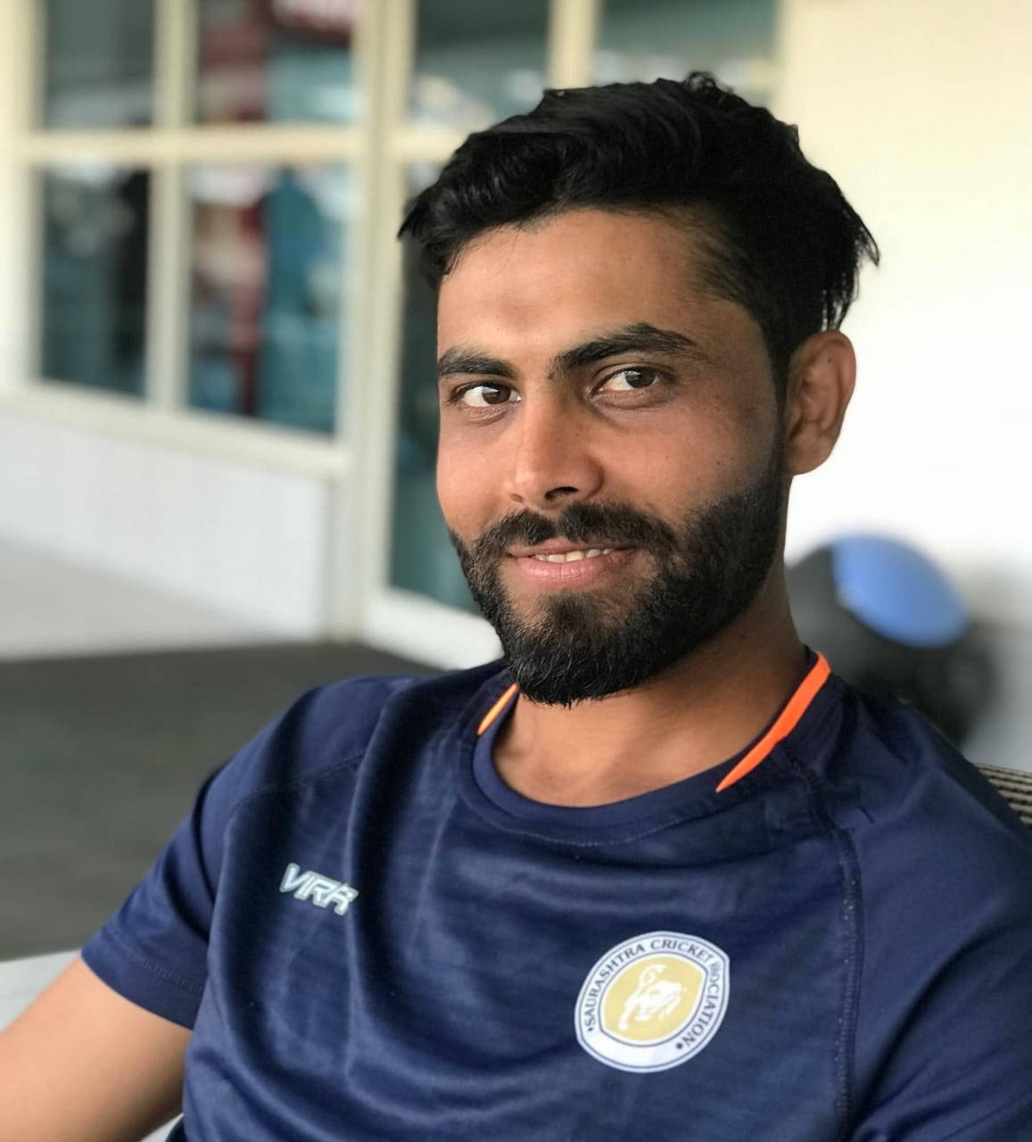 Ravindra Jadeja, navy blue sports shirt, orange accents, HD Phone Wallpaper
