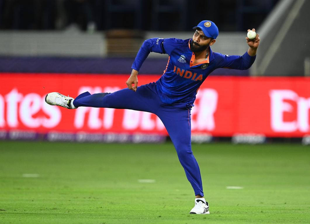 Ravindra Jadeja, blue uniform, vibrant green field, SD Desktop Wallpaper