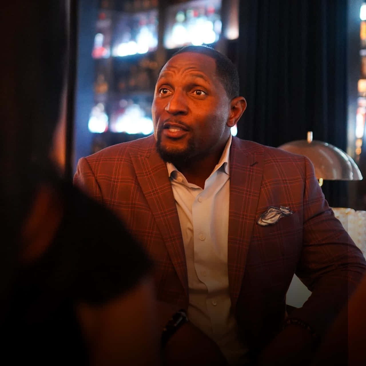 Ray Lewis, plaid blazer, dimly lit bar, HD Desktop Wallpaper