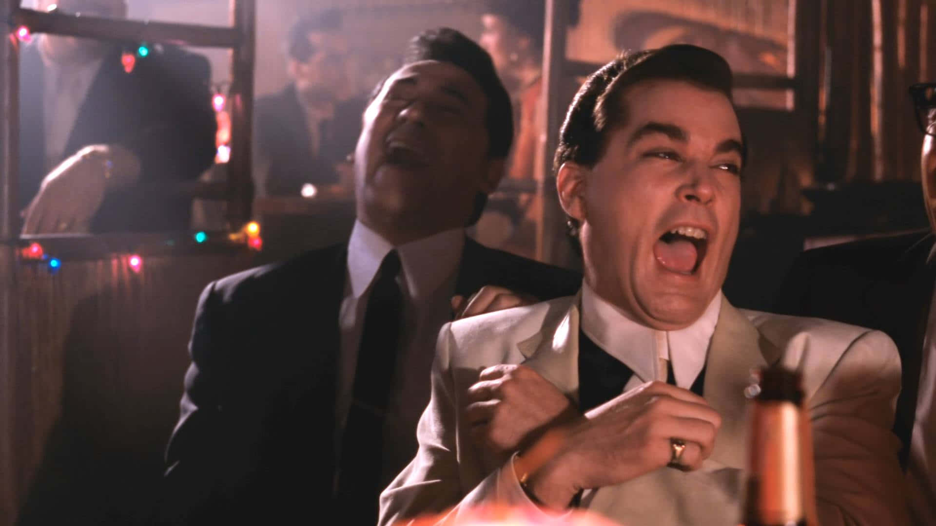 Ray Liotta, dimly lit bar, festive string lights, Full HD Desktop Wallpaper