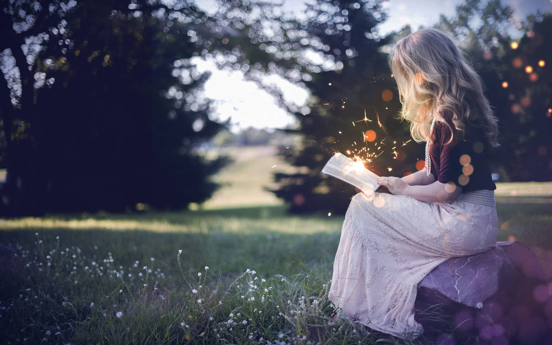 Reading Girl, sunlit meadow, book that emits magical sparks, Full HD Desktop Wallpaper