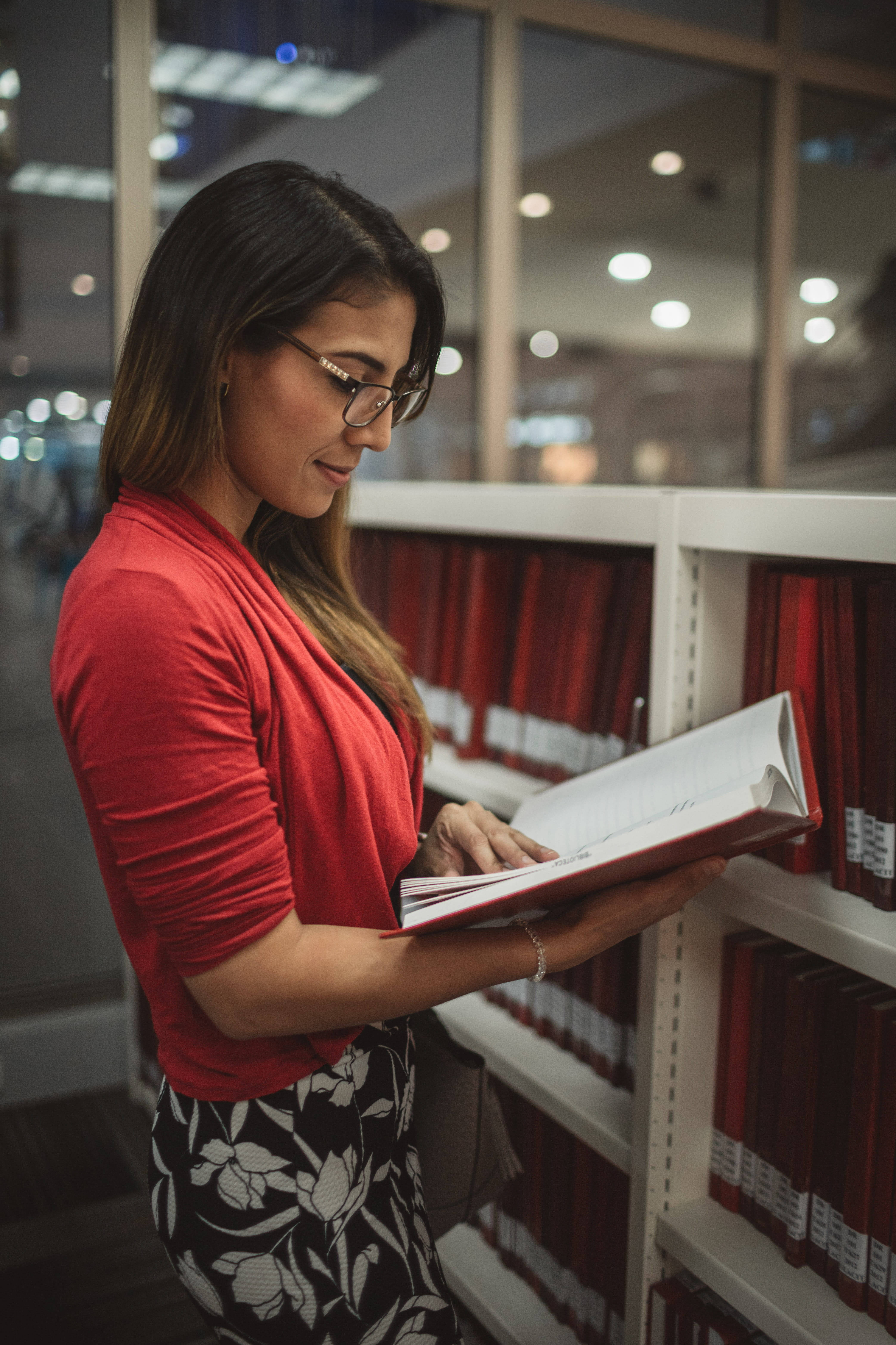 red top, floral skirt, library shelves, 5K Phone Wallpaper