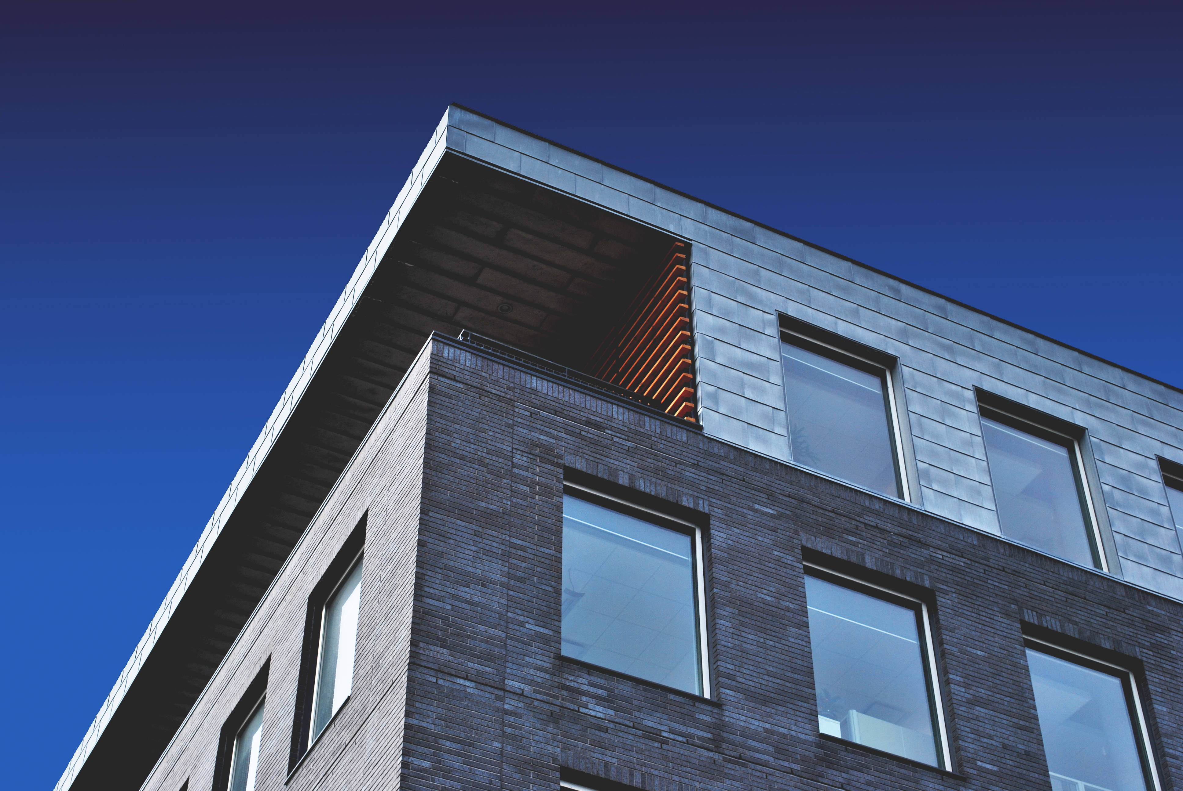 house corner architecture, dark brick, glass windows, 4K Desktop Wallpaper