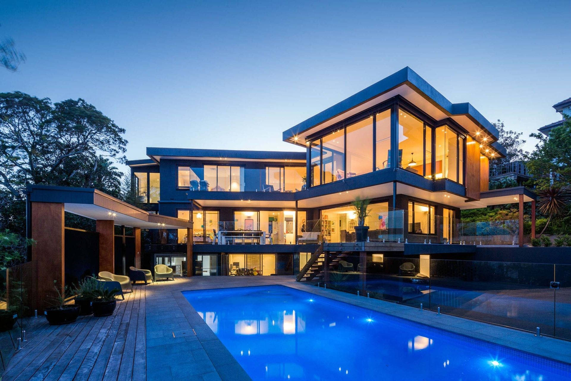modern glass house, warm interior lights, glowing blue pool, Full HD Desktop Wallpaper