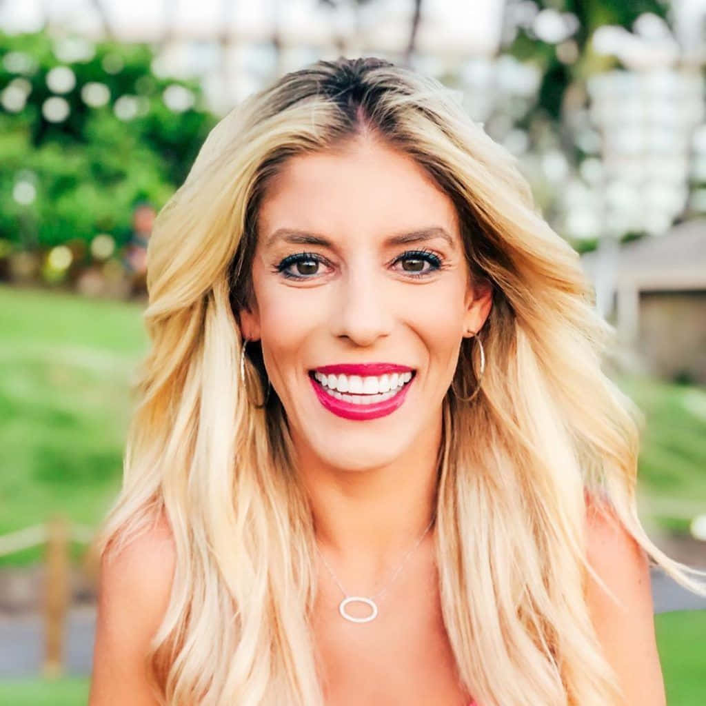 Rebecca Zamolo, bright red lipstick, soft green outdoor backdrop, SD Desktop Wallpaper