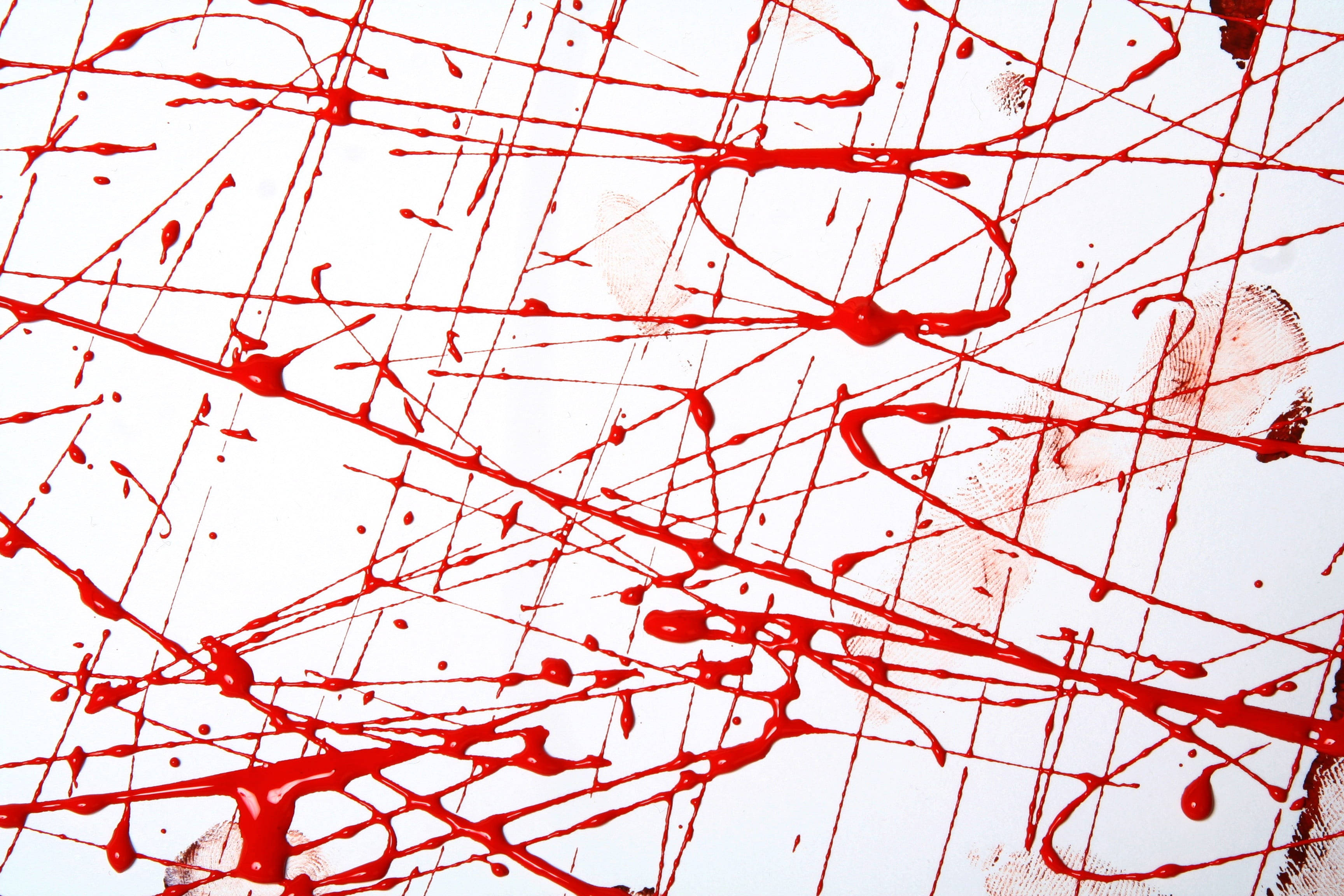 red abstract art, paint splatters, stark white surface, 2K Desktop Wallpaper