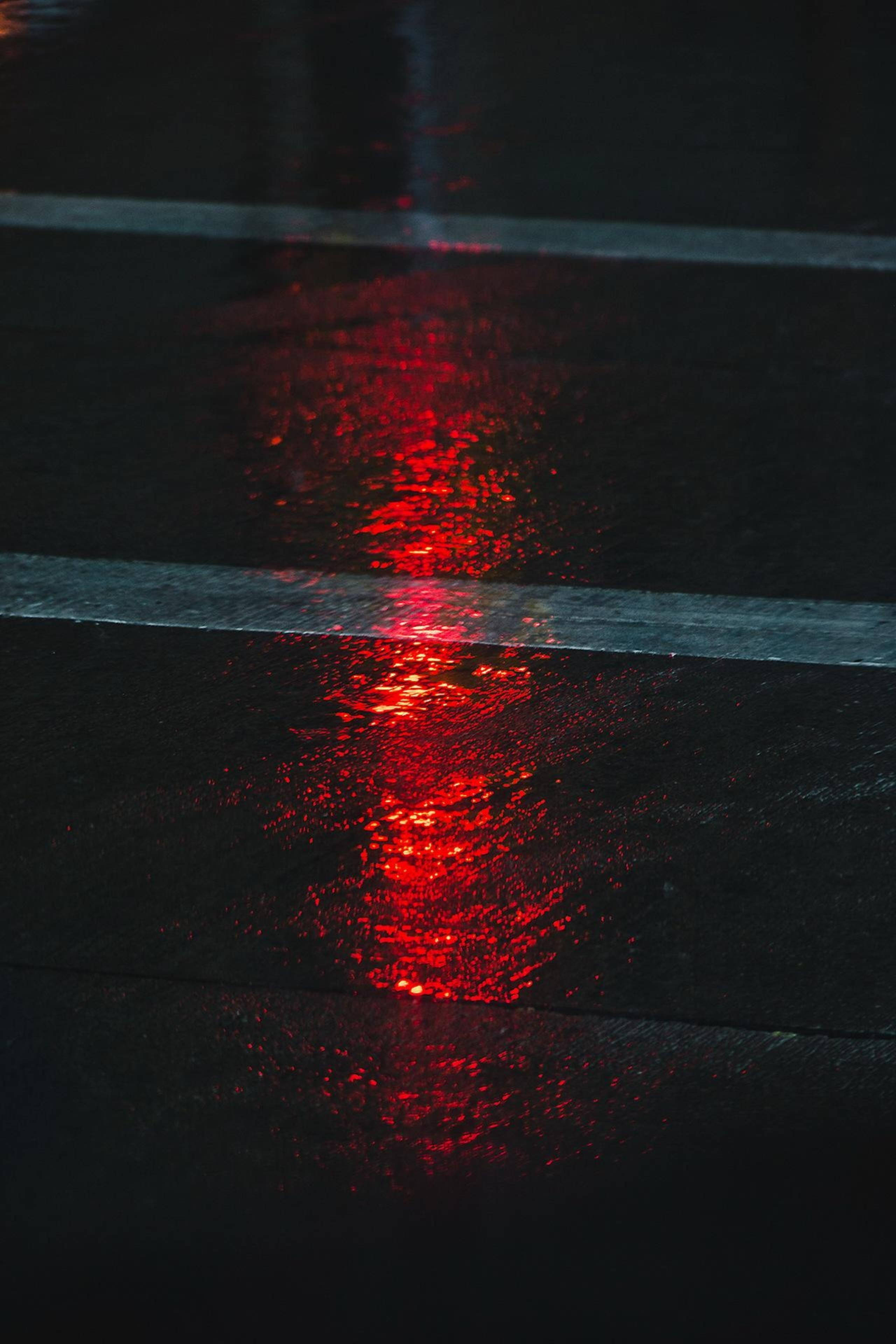 red aesthetic neon, street light, rain-slicked pavement, 4K Phone Wallpaper