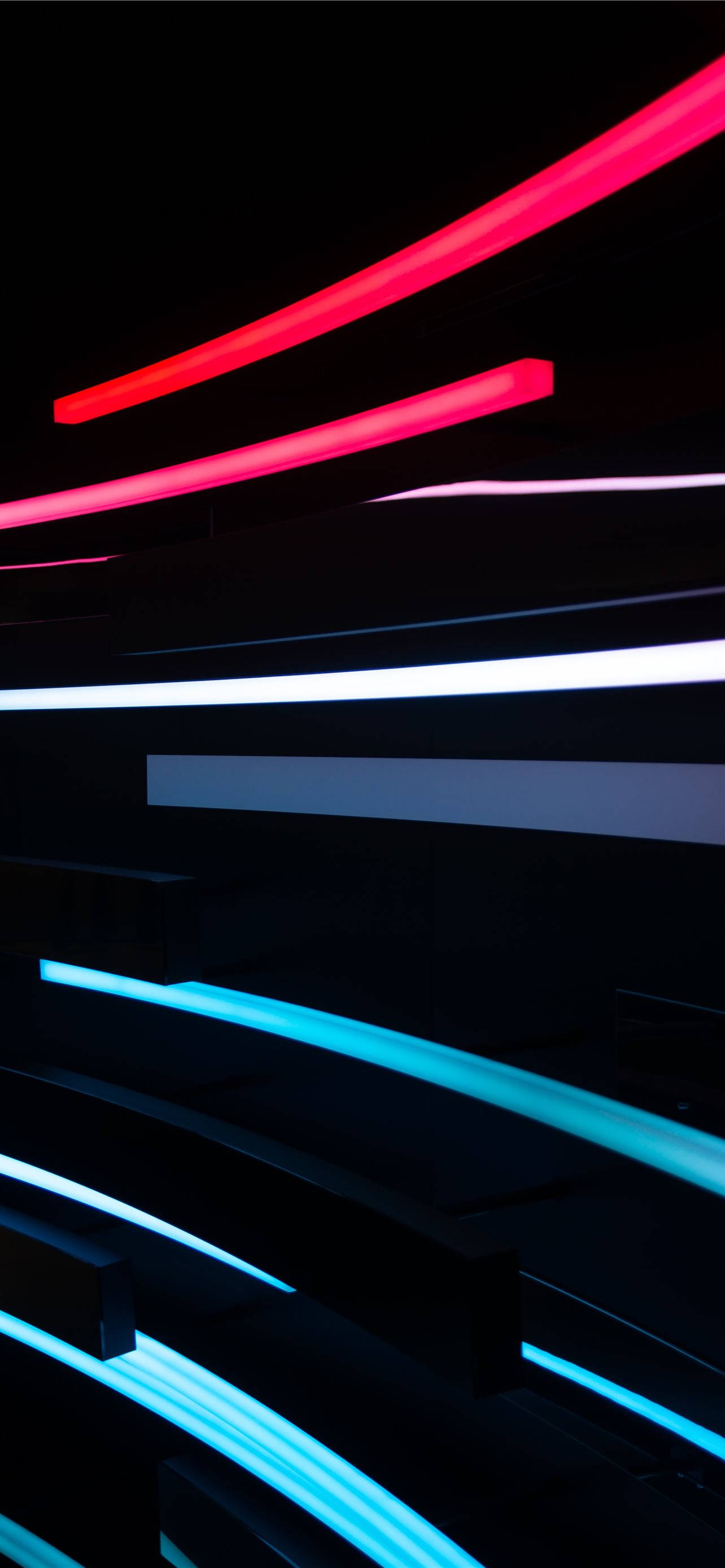 Red and Black iPhone, neon light streaks, deep black background, 2K Phone Wallpaper