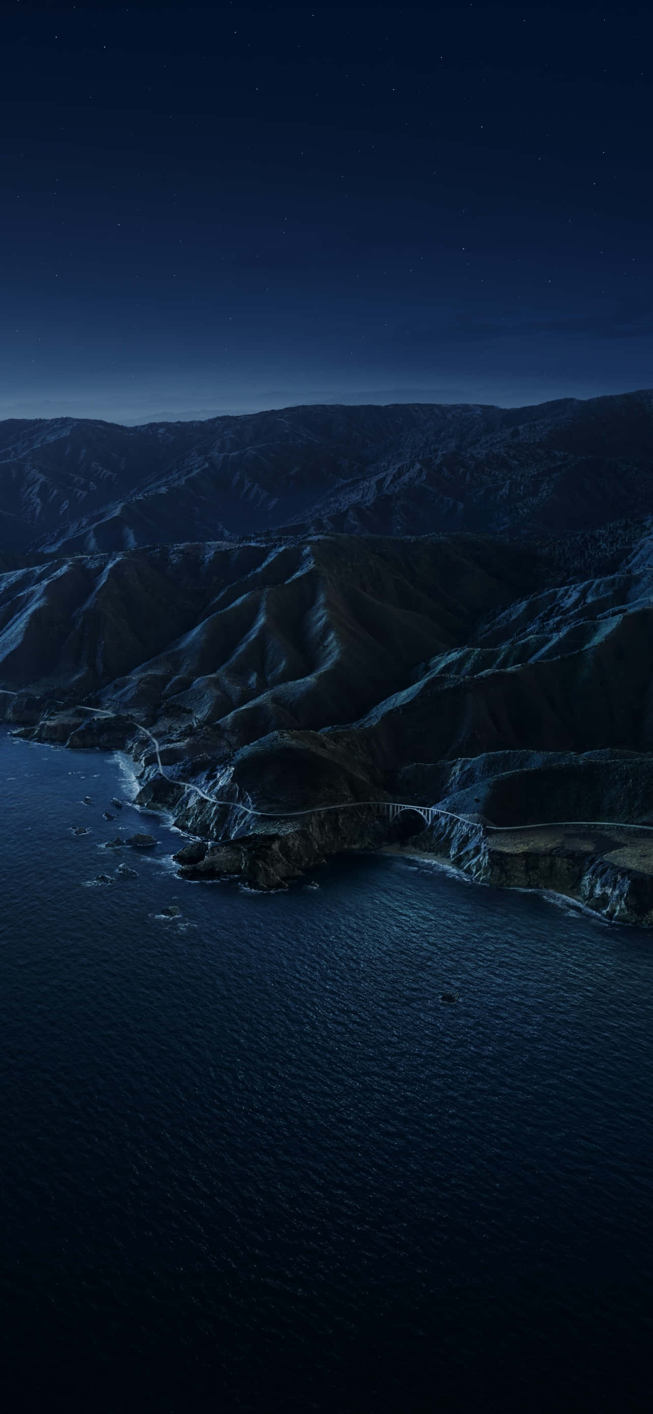 solid blue iPhone, coastal road, dark cliffs, 2K Phone Wallpaper