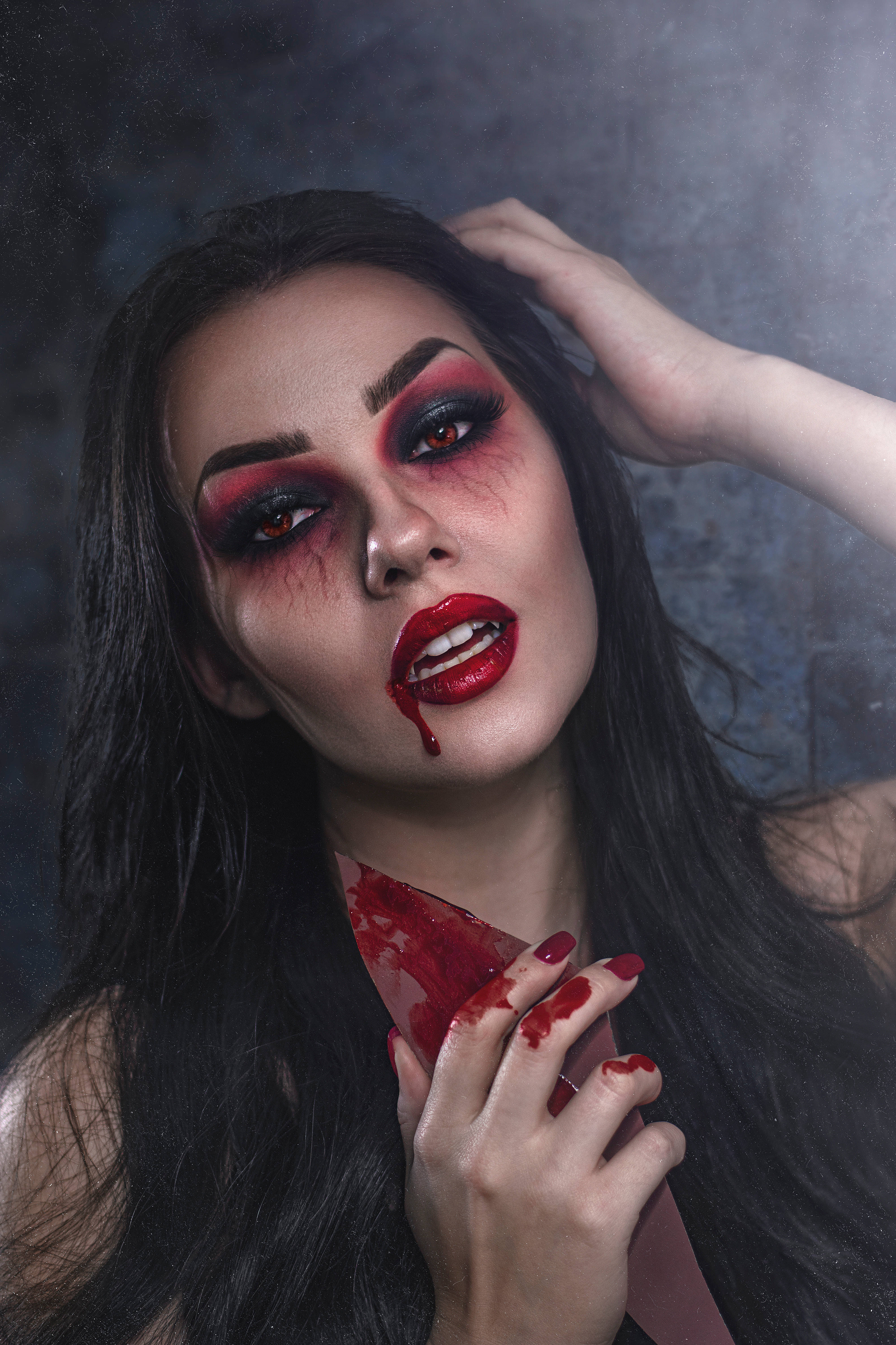 red eye makeup, blood dripping from lips, bloody knife, 5K Phone Wallpaper