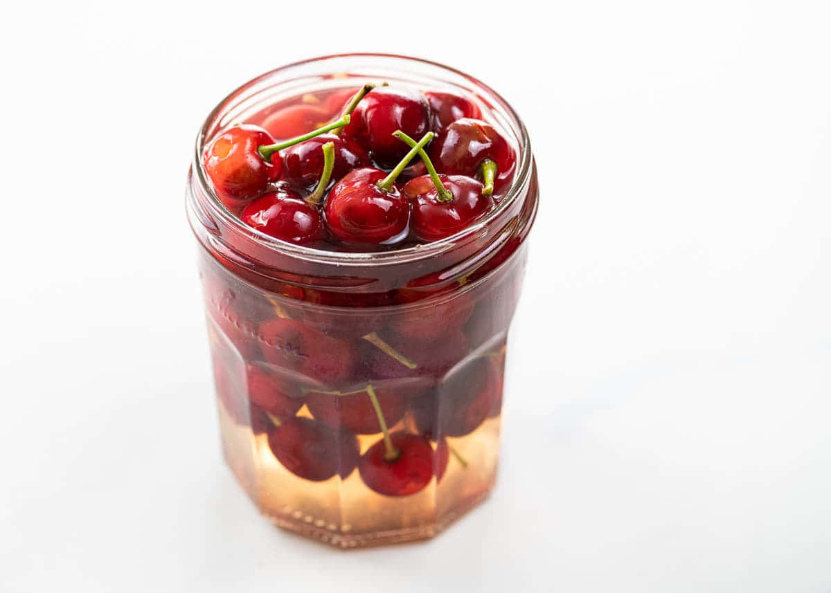 Red Cherries, glass jar, glossy red cherries, SD Desktop Wallpaper