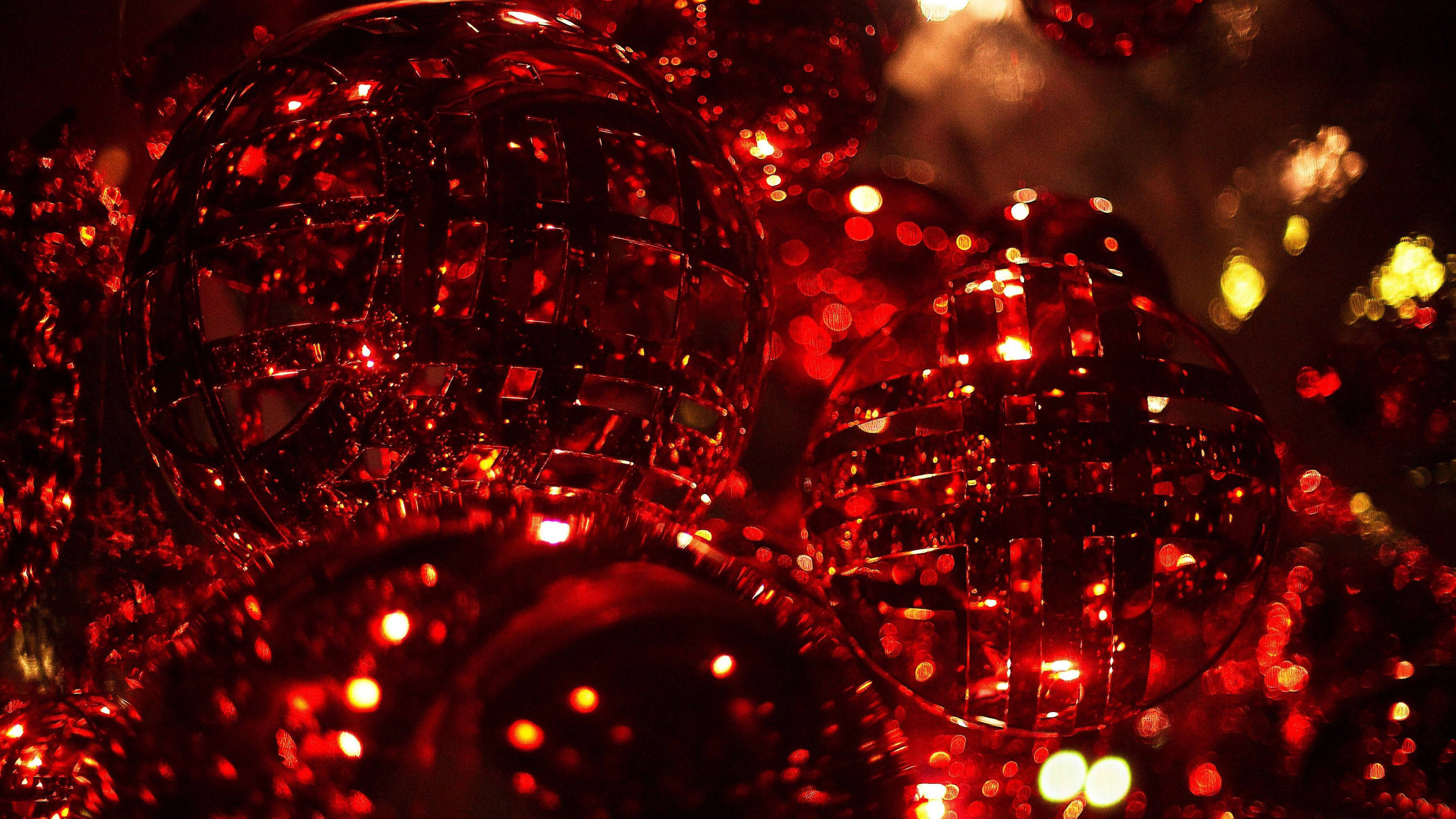 glossy red disco balls, warm lights, festive holiday, 2K Desktop Wallpaper