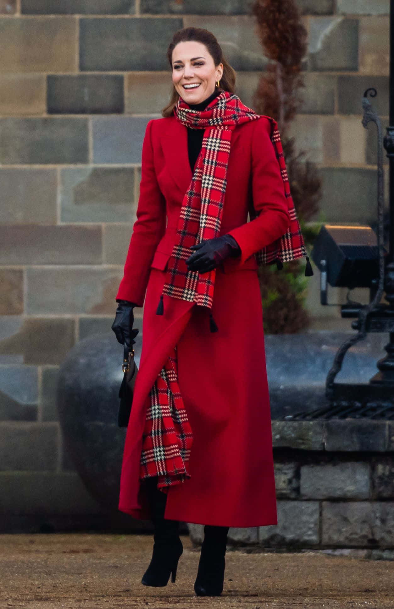 vibrant red coat, matching plaid scarf, stone building backdrop, Full HD Phone Wallpaper