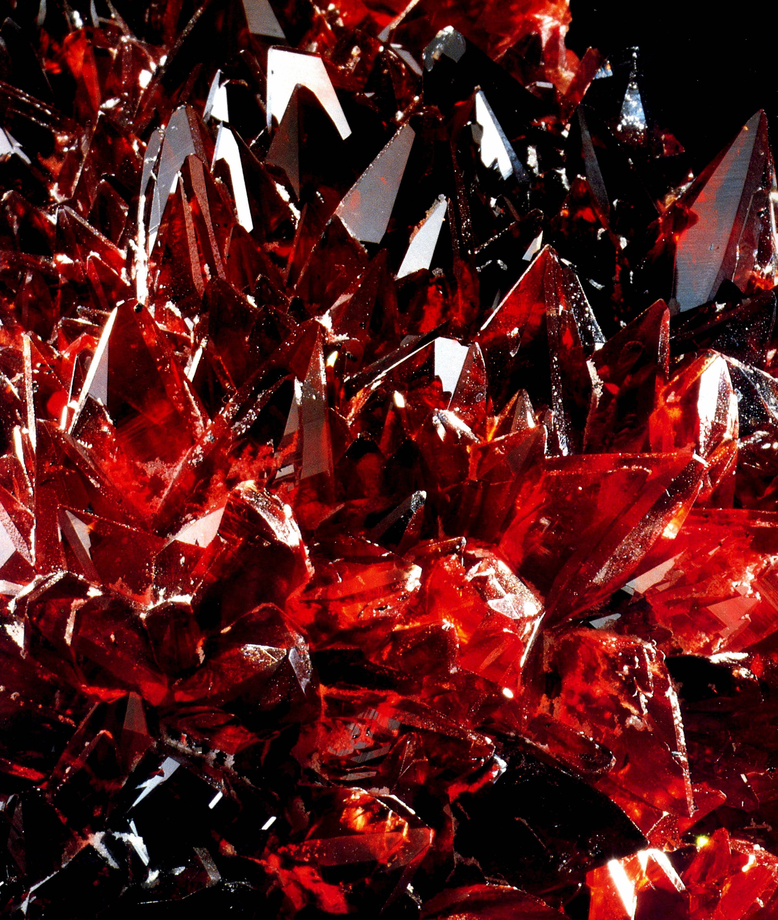 sharp red crystal stone, vibrant red crystal, sharp facets, 2K Phone Wallpaper