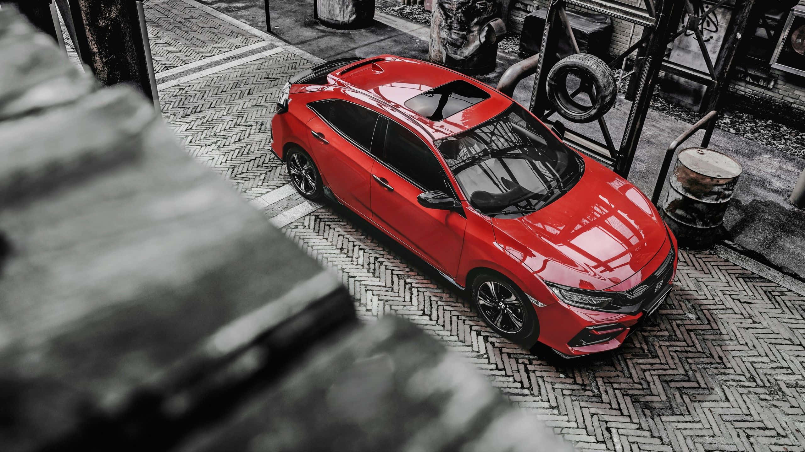 hatchback, red sports car, herringbone-patterned pavement, 2K Desktop Wallpaper