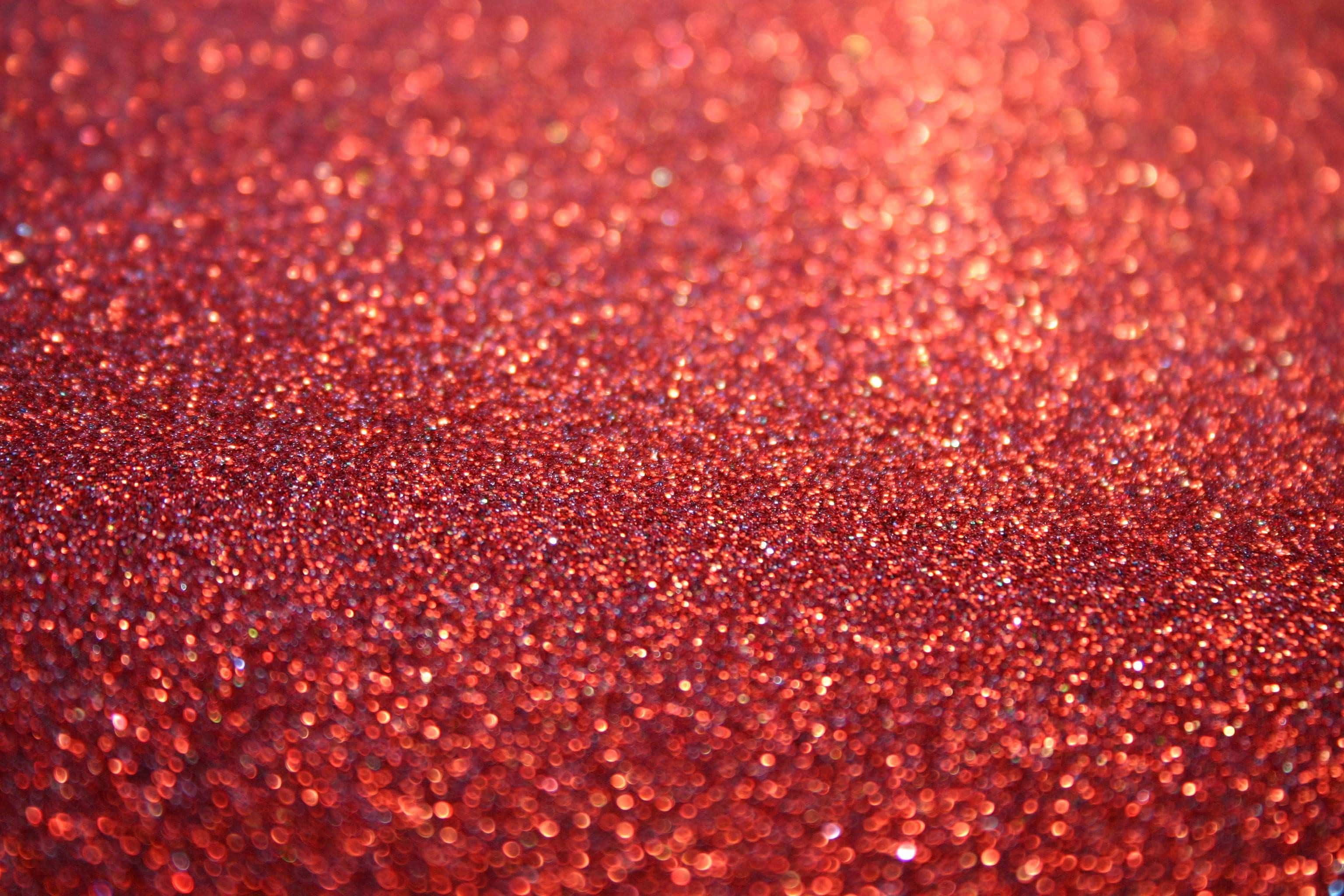red glitter, vibrant red glitter, sparkling particles, 2K Desktop Wallpaper