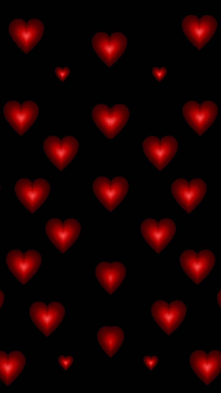 red hearts, black background, glowing, HD Phone Wallpaper