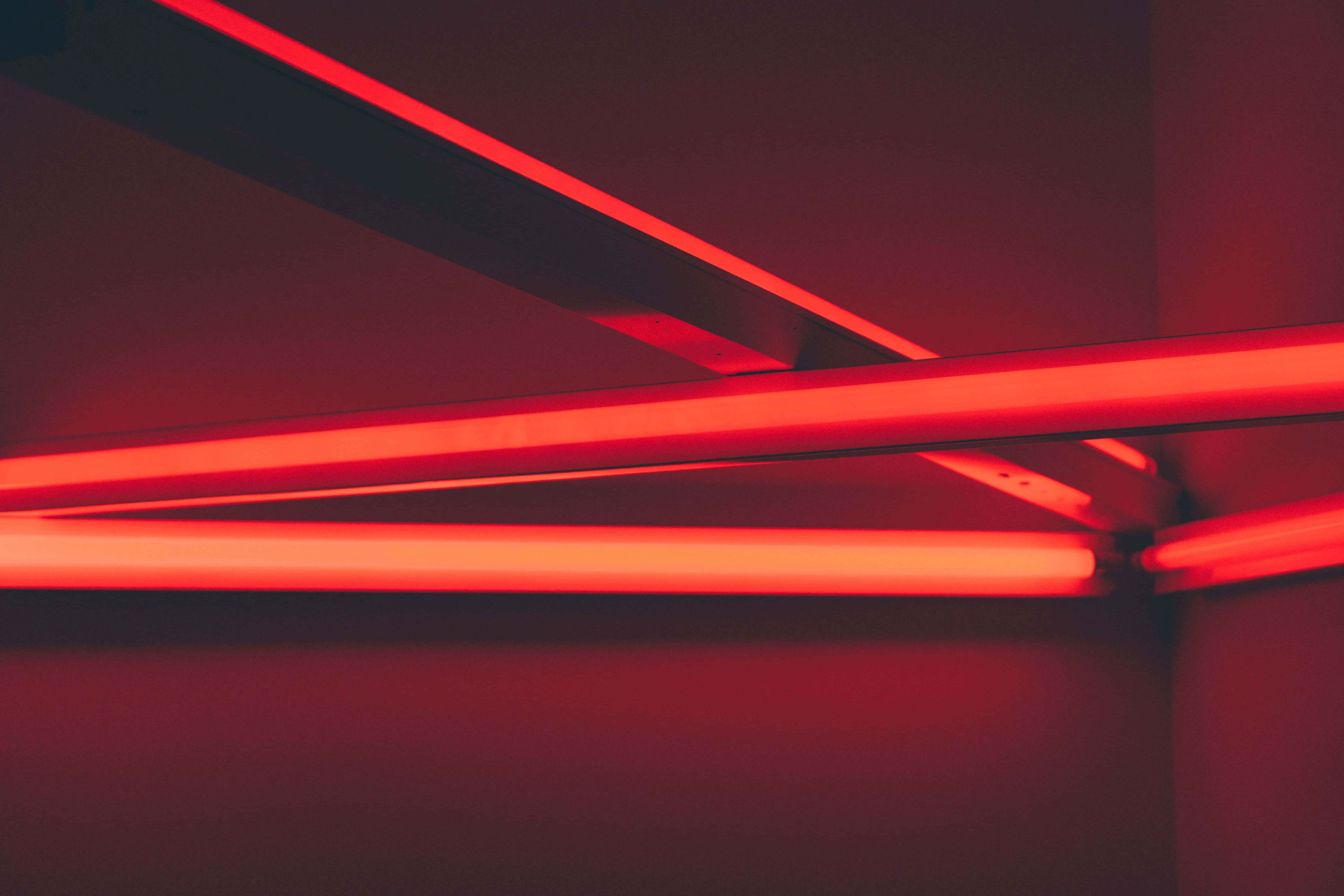 Red LED light, vibrant red neon tubes, dark ceiling, 5K Desktop Wallpaper