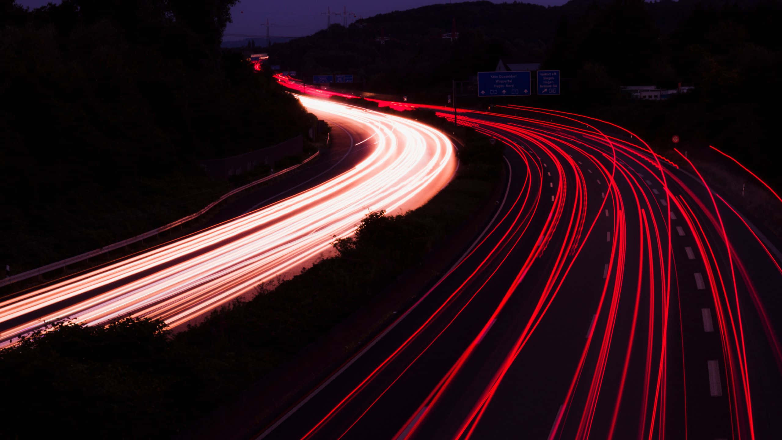 Red Pc, gaming PC setup, glowing red and white light trails, 2K Desktop Wallpaper