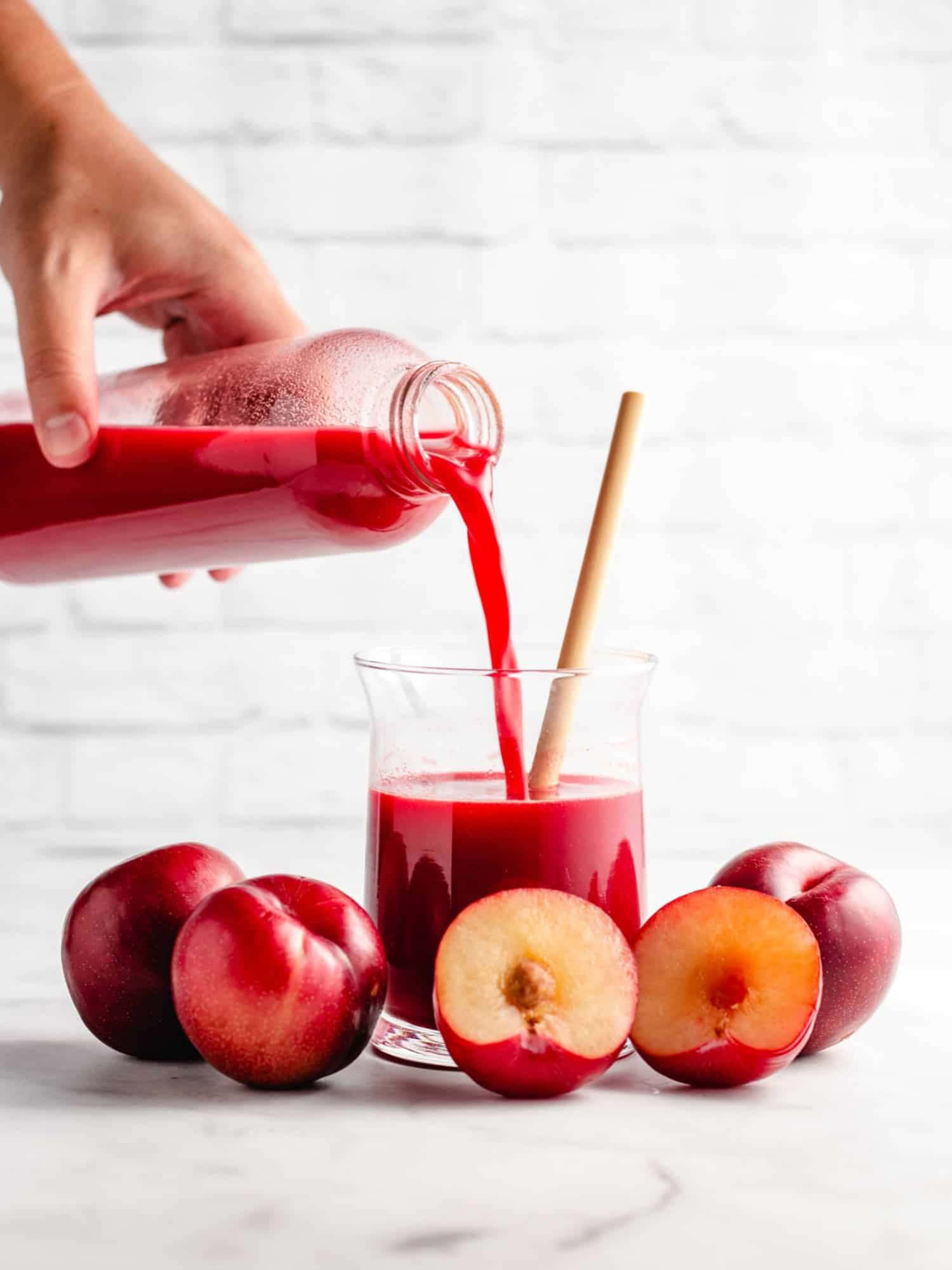 red plum, wooden table, white marble surface, Full HD Phone Wallpaper