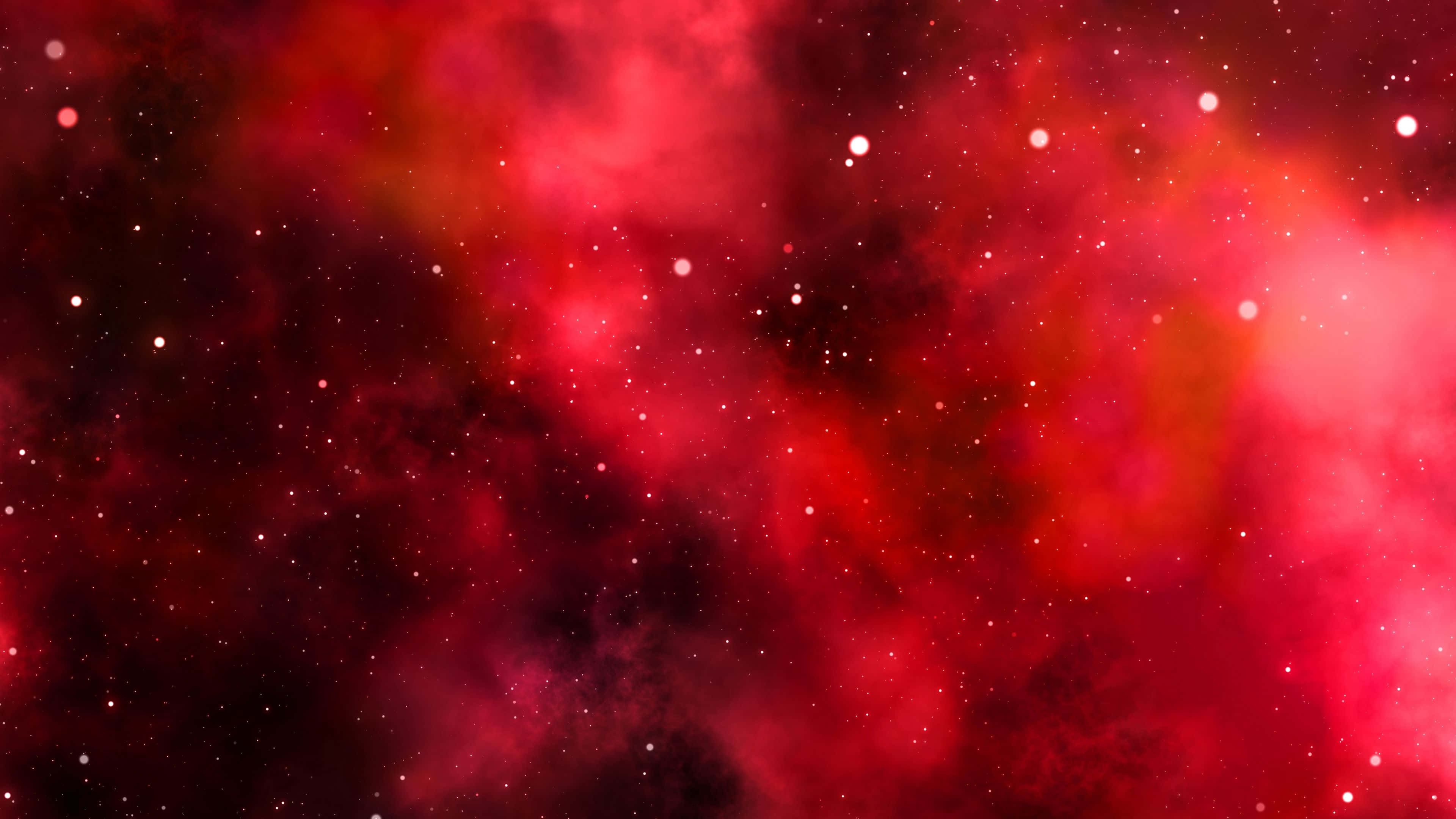 Red Space, vibrant red nebula clouds, glowing stars, 4K Desktop Wallpaper