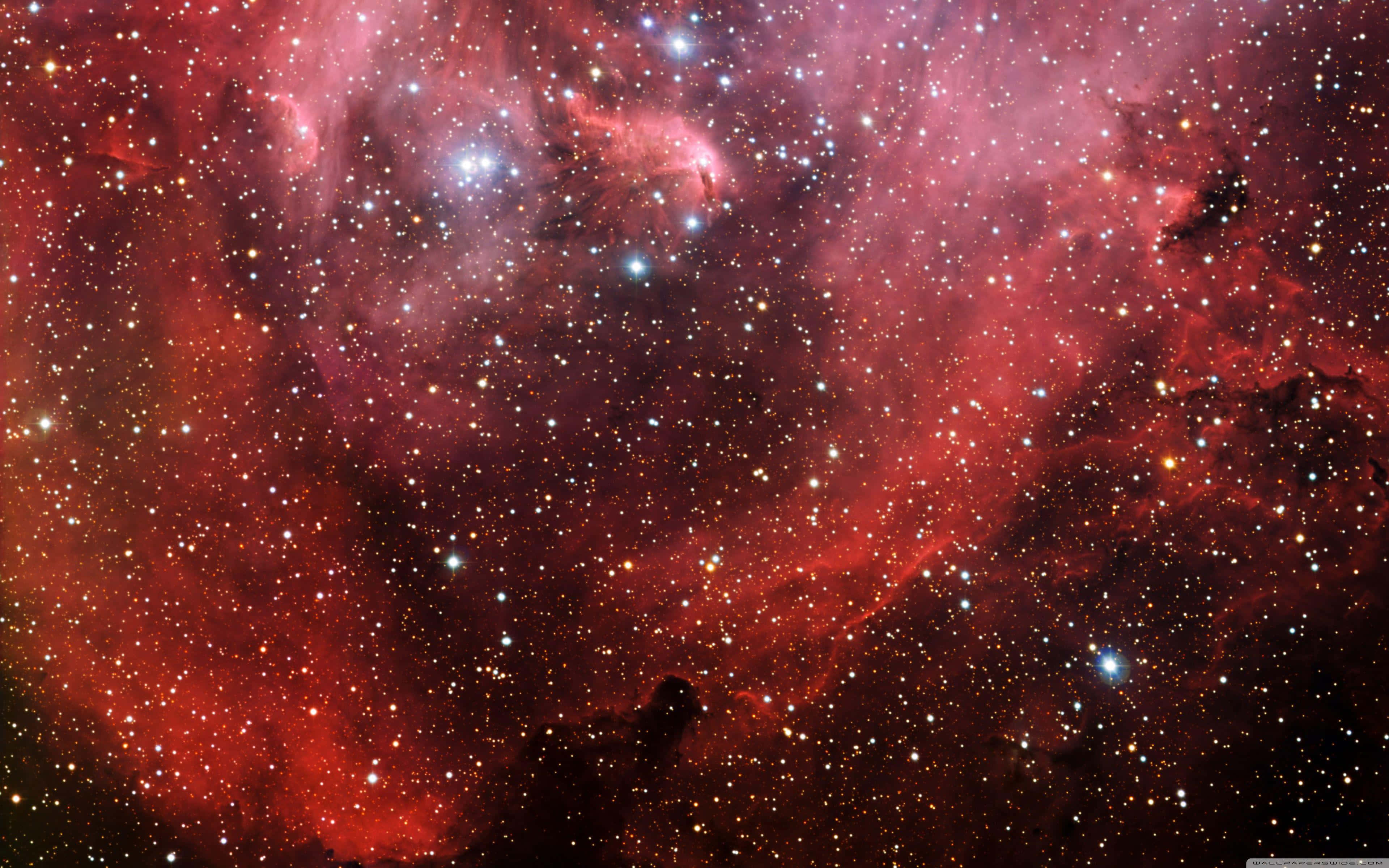 Red Space, glowing red galaxies, vibrant red cosmic clouds, 4K Desktop Wallpaper