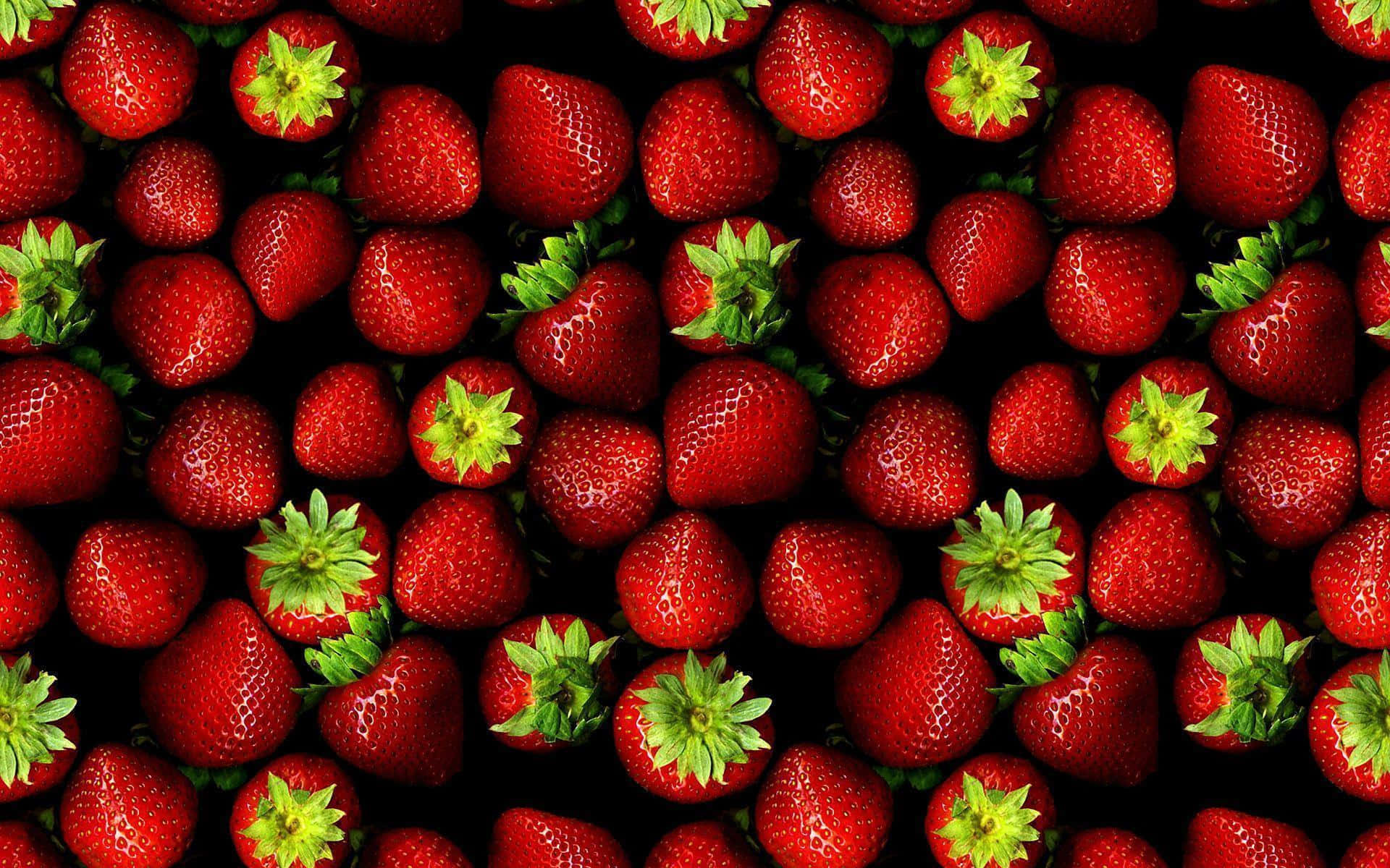 vibrant red strawberries, green tops, black background, Full HD Desktop Wallpaper