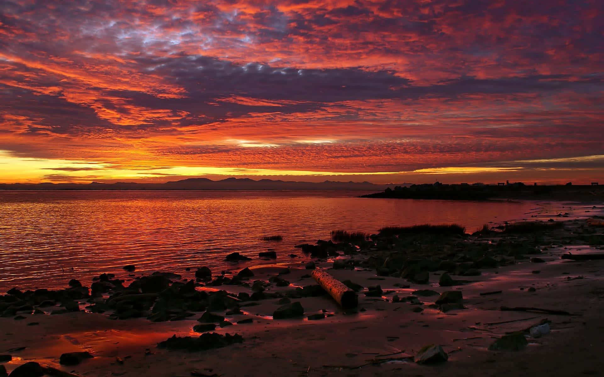 sunset, rocky shoreline, distant mountains, Full HD Desktop Wallpaper