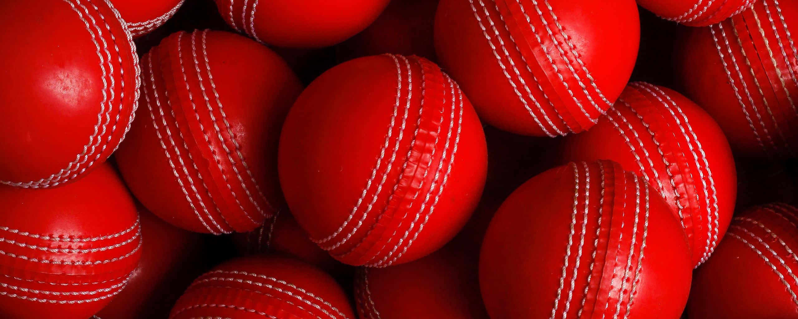 vibrant red, cricket balls, white stitching, 2K Desktop Wallpaper