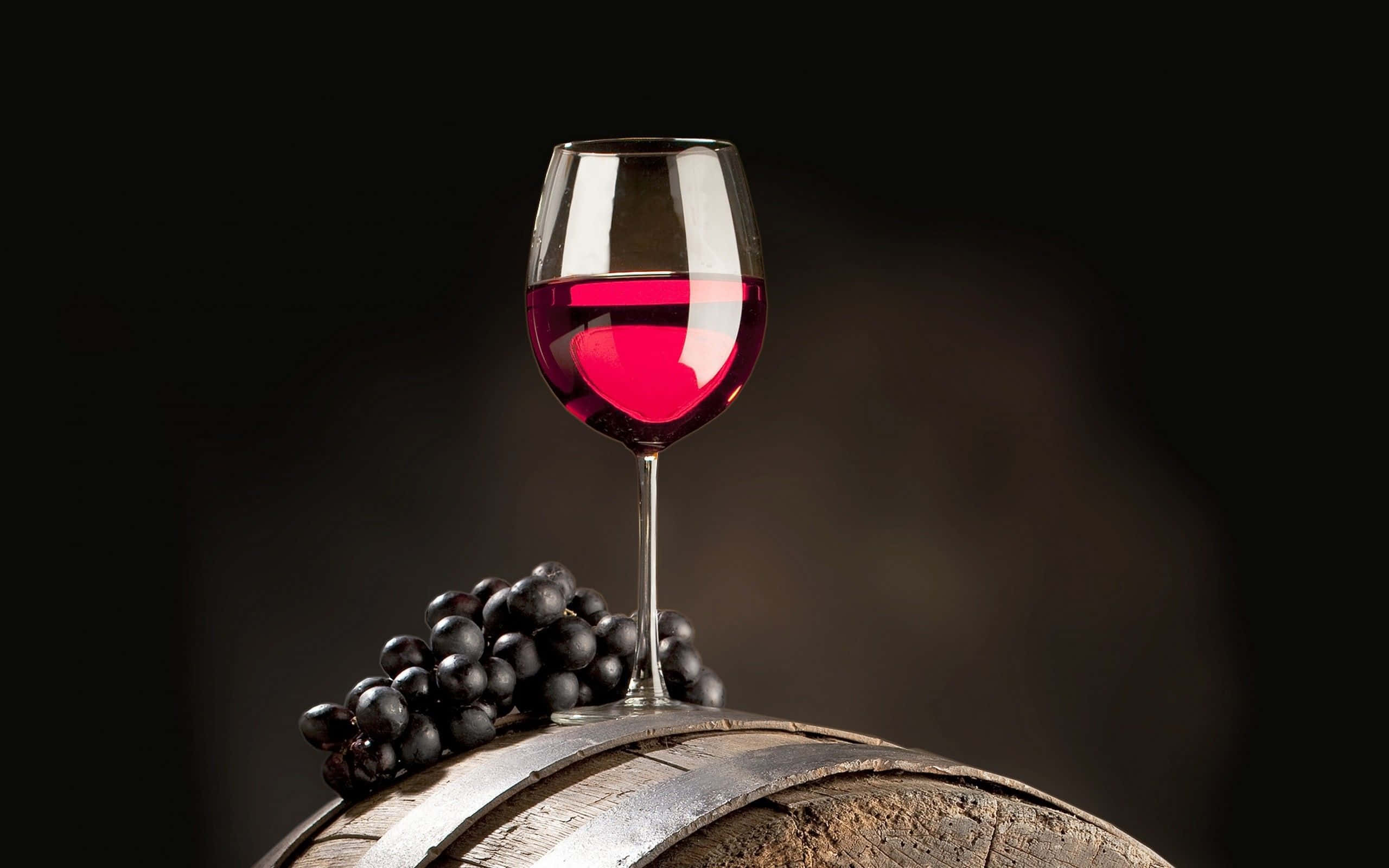 red wine glass, weathered wooden barrel, dark grapes, 2K Desktop Wallpaper