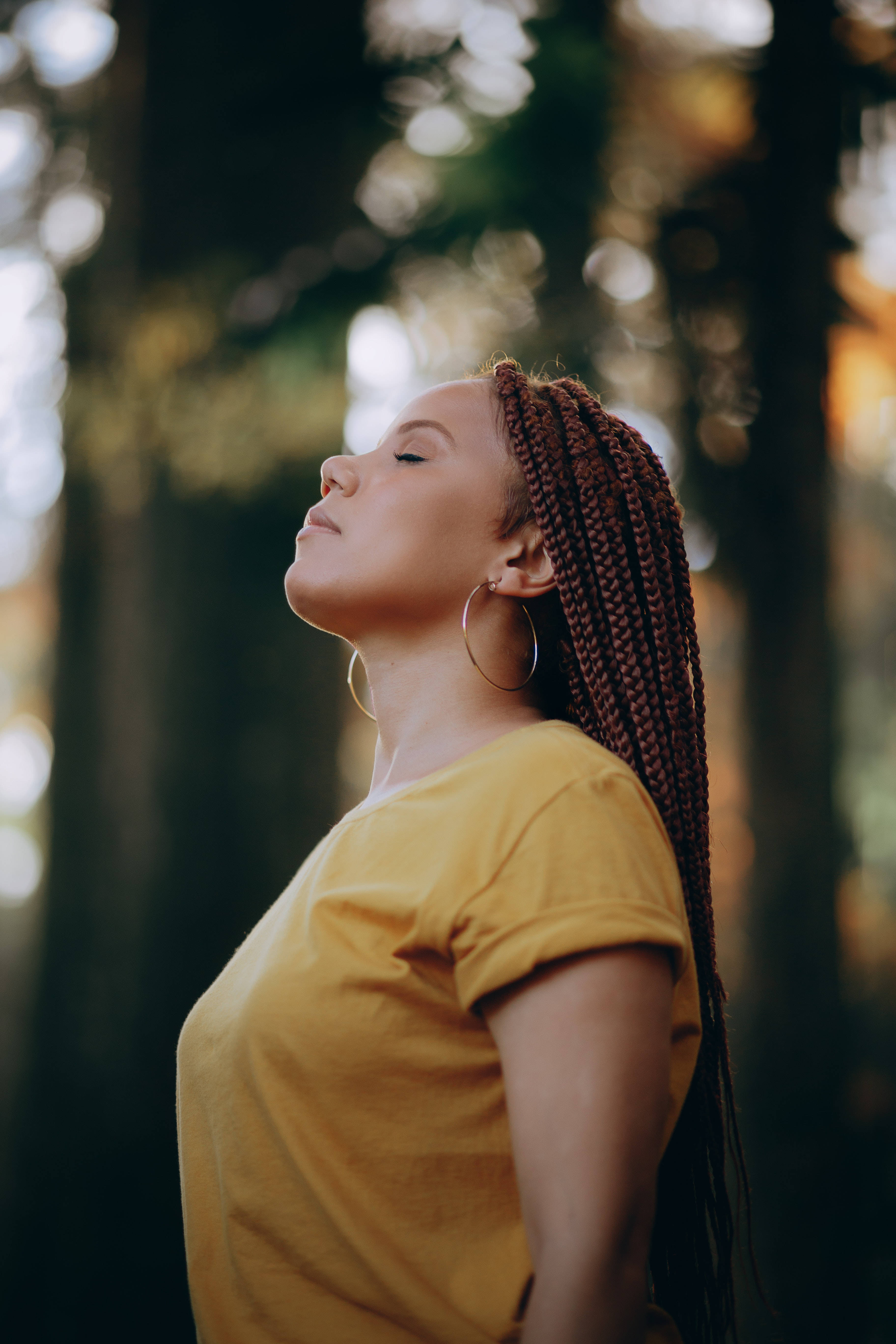 woman with braided hair, yellow shirt, sunlit forest, 5K Phone Wallpaper