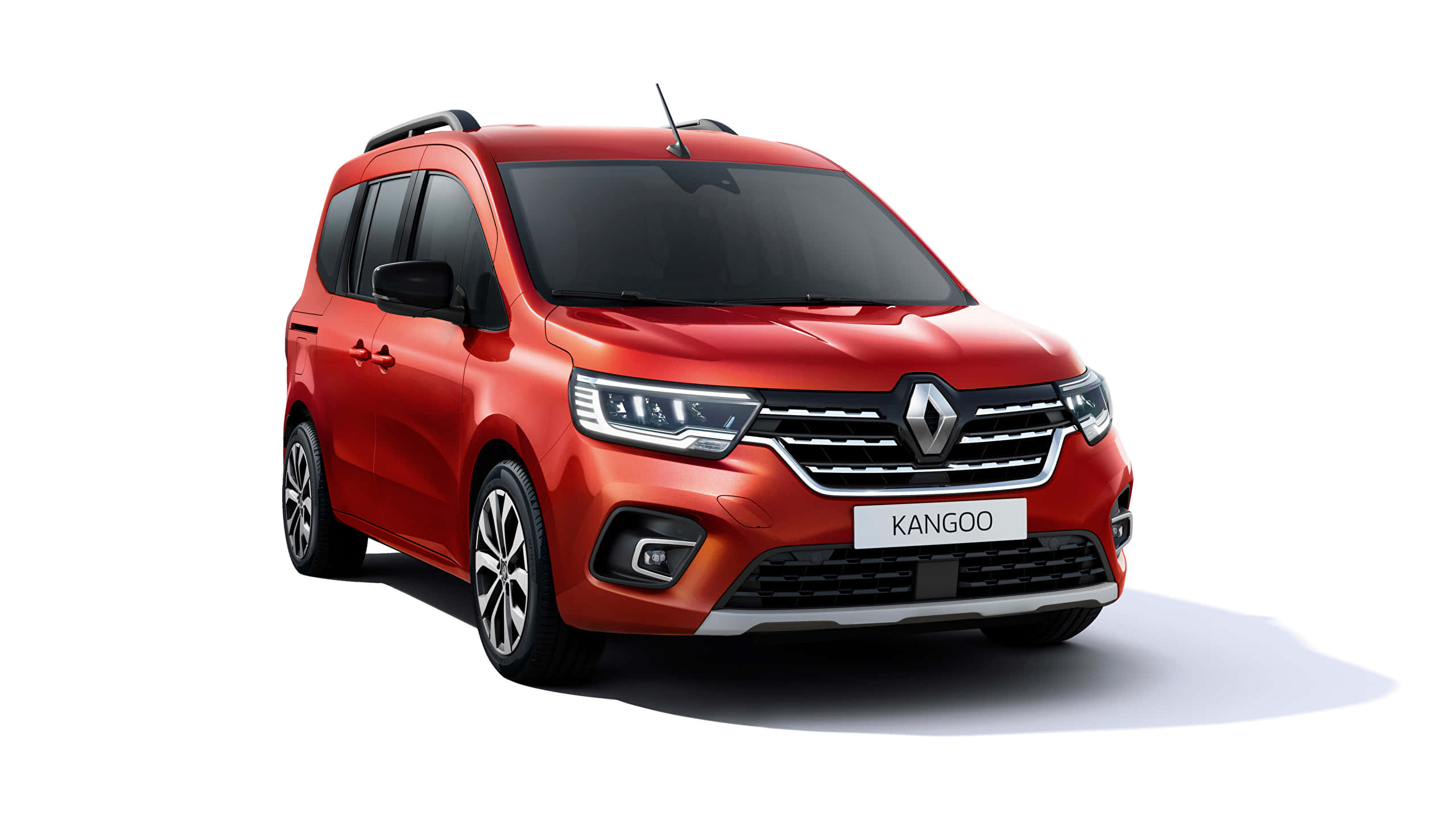 Renault Kangoo, vibrant red, studio lighting, 2K Desktop Wallpaper